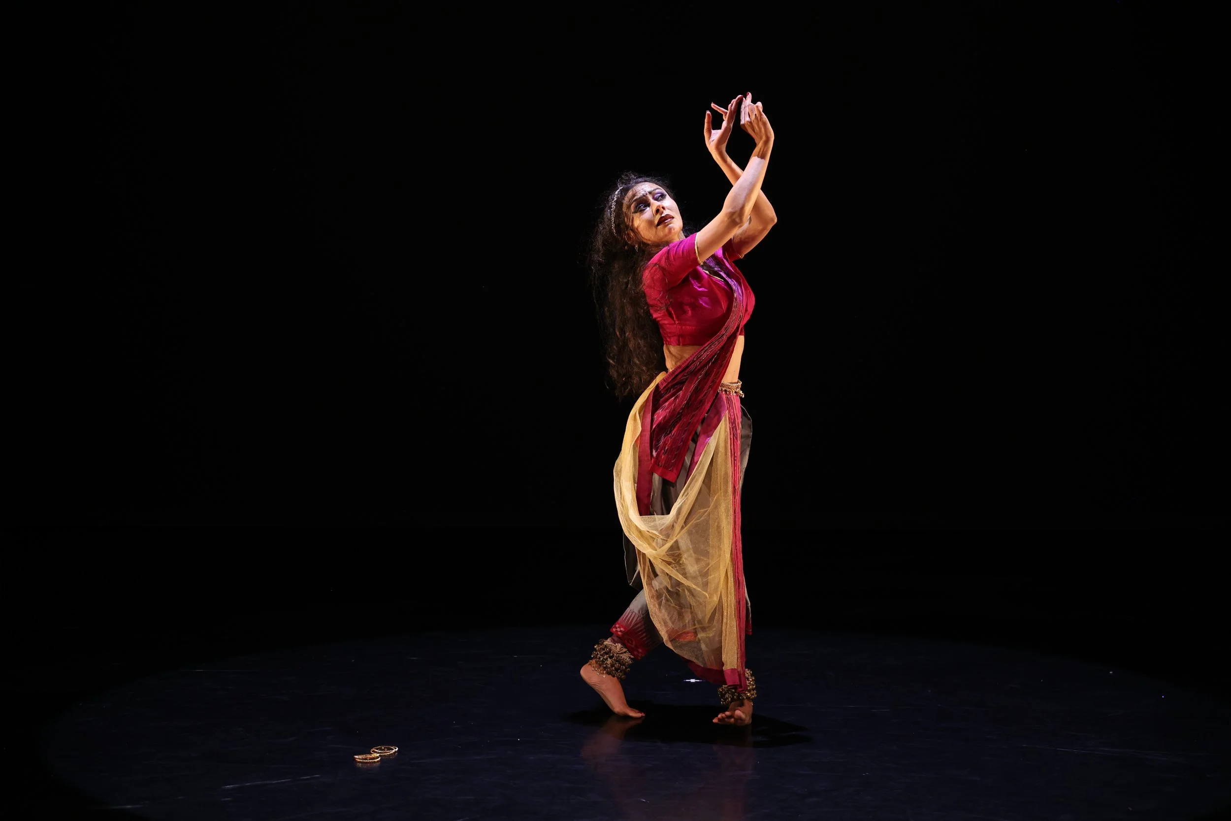 Kaustavi Sarkar on stage in pink costume