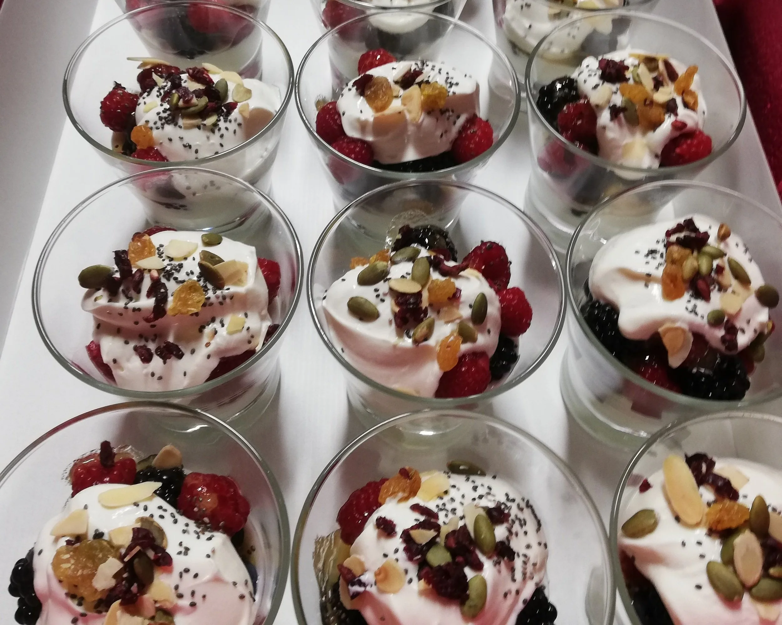Layers of creamy yogurt, crisp granola, and seasonal fruit.