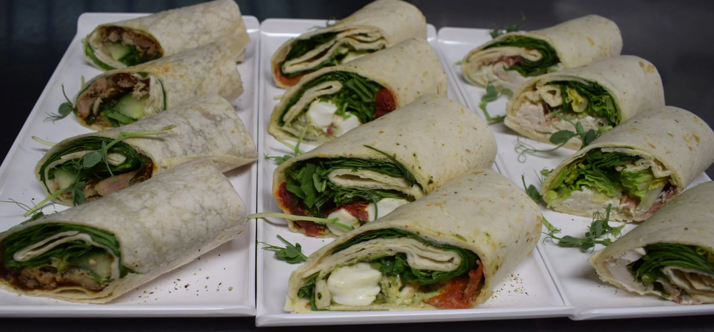 Wraps platter for delivery.