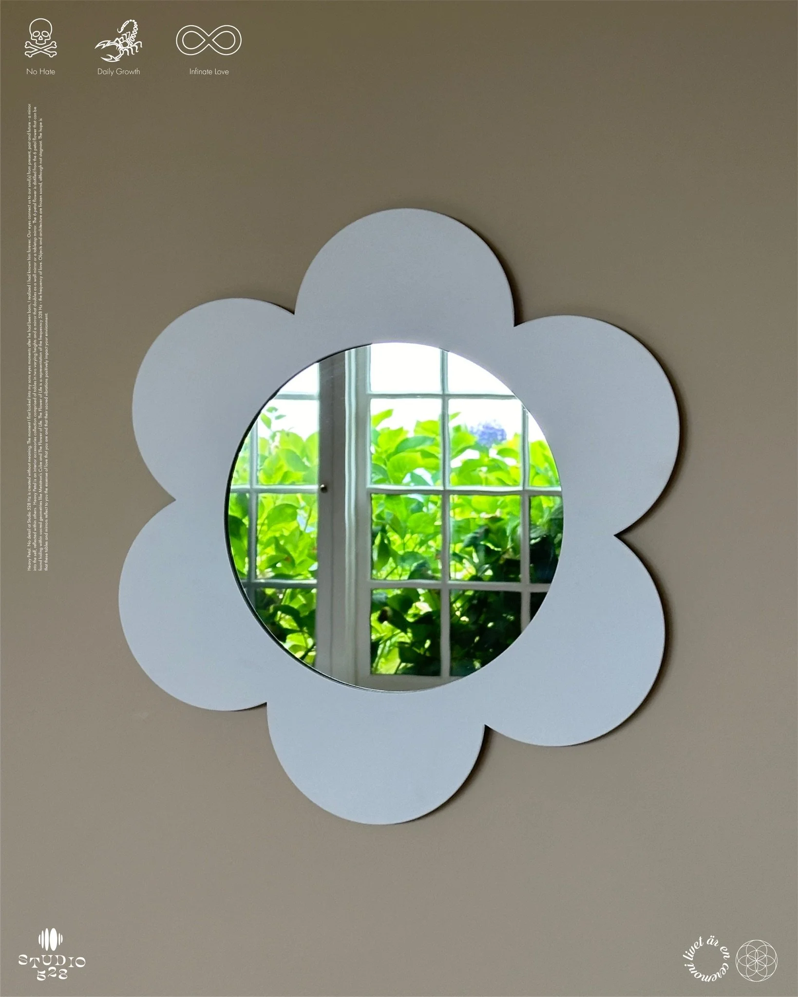 A mirror in the shape of a flower with five petals, reflecting a window with green plants outside.