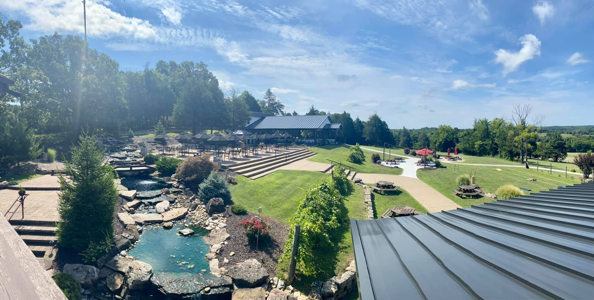 Logo for The Terrace at French Village with a stylized fleur-de-lis symbol in the background.