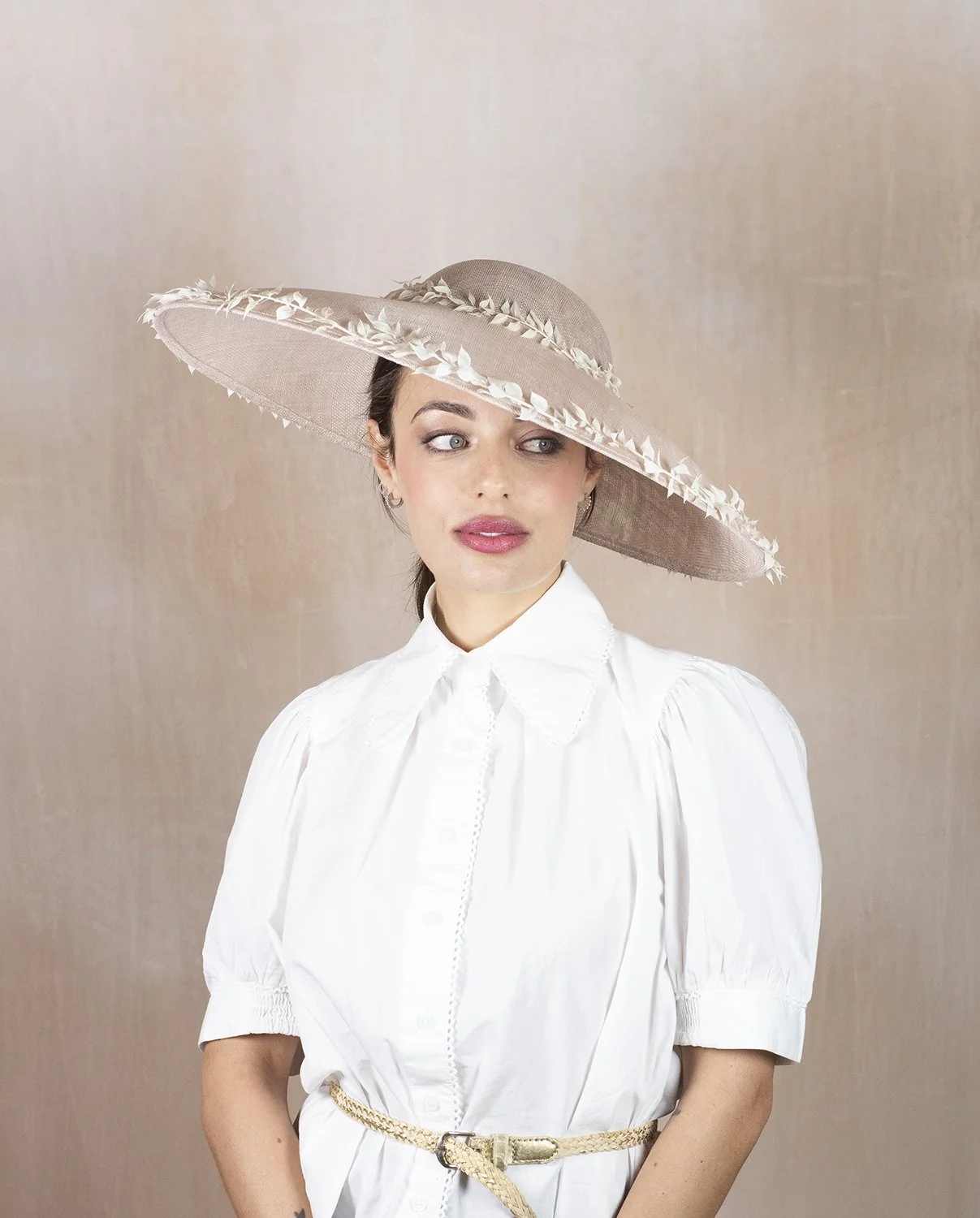 Lightweight summer wedding hat styled for an outdoor garden wedding