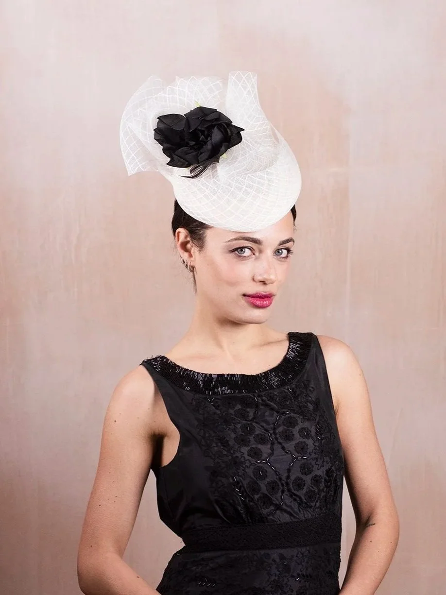 Elegant winter wedding hat featuring luxurious seasonal detailing
