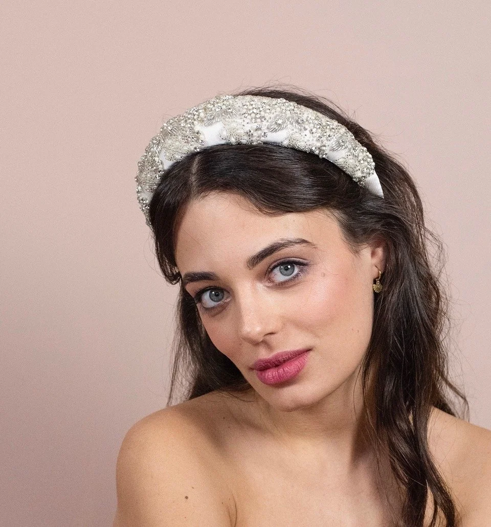 Luxury bridal accessories including bespoke wedding headpiece and veil