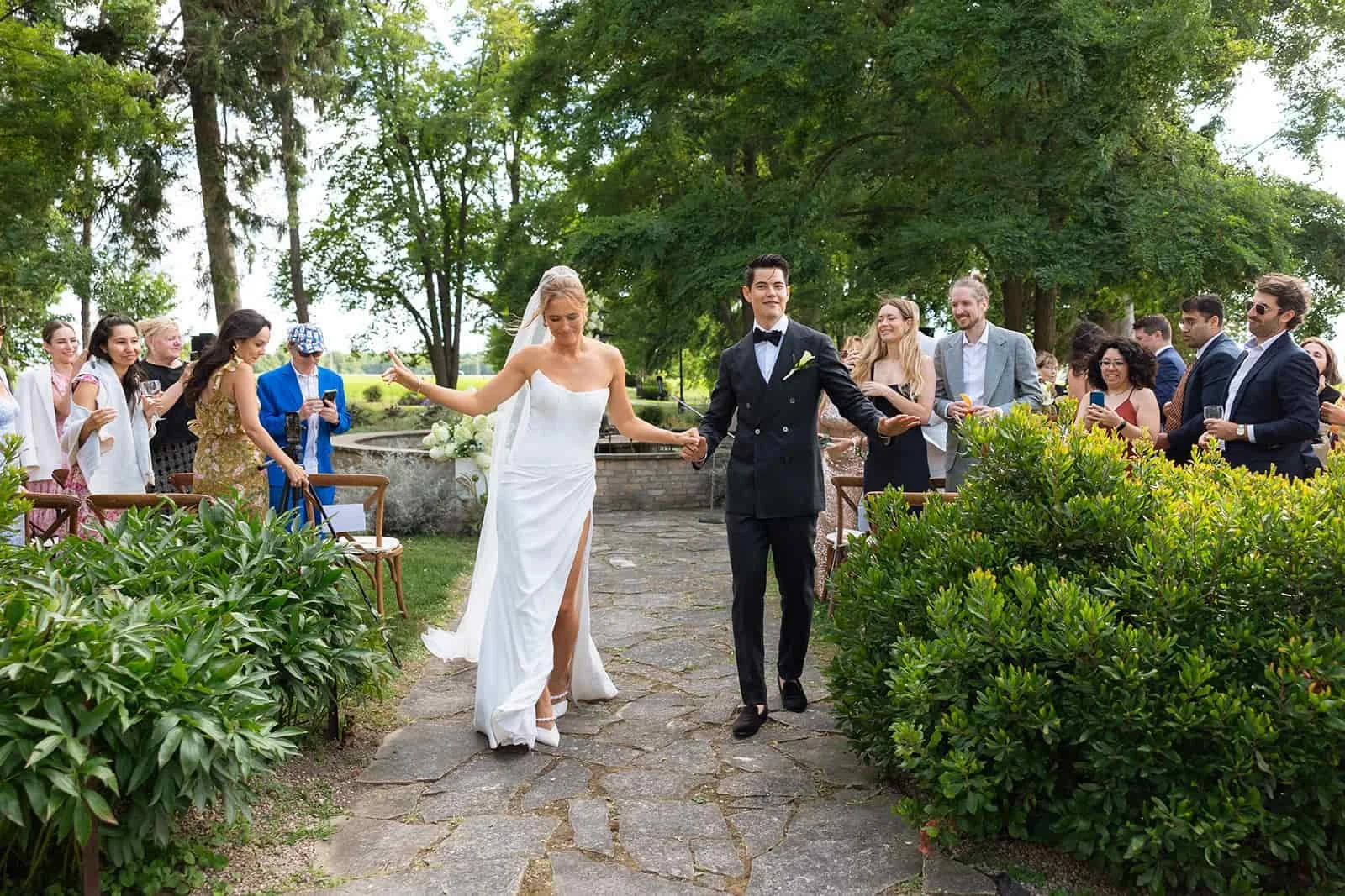 Bride and groom during recessional at Lune 1860 wedding ceremony