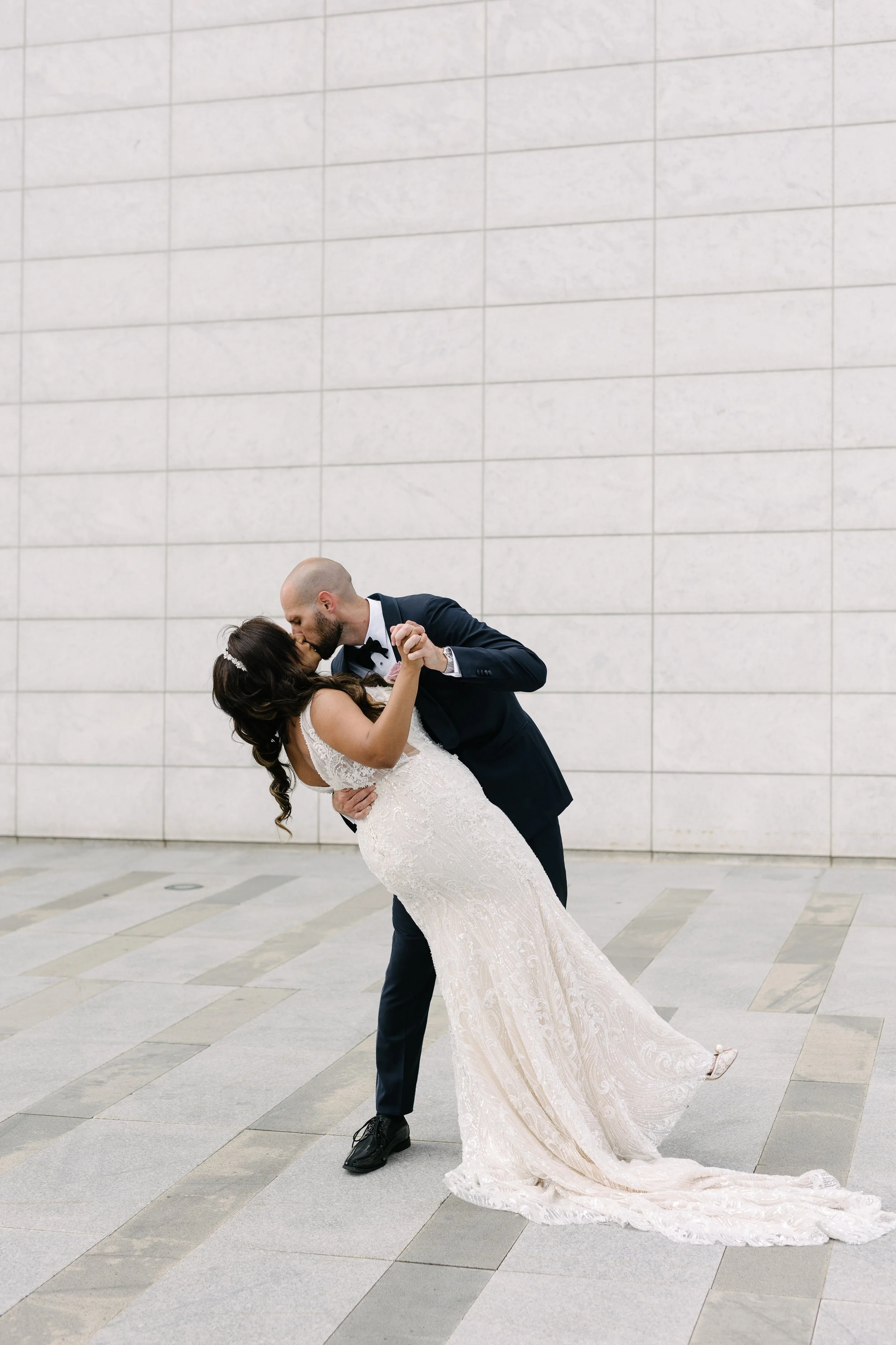 Bride and groom celebrating their Guyanese-Italian fusion wedding at Graydon Hall Manor in Toronto.