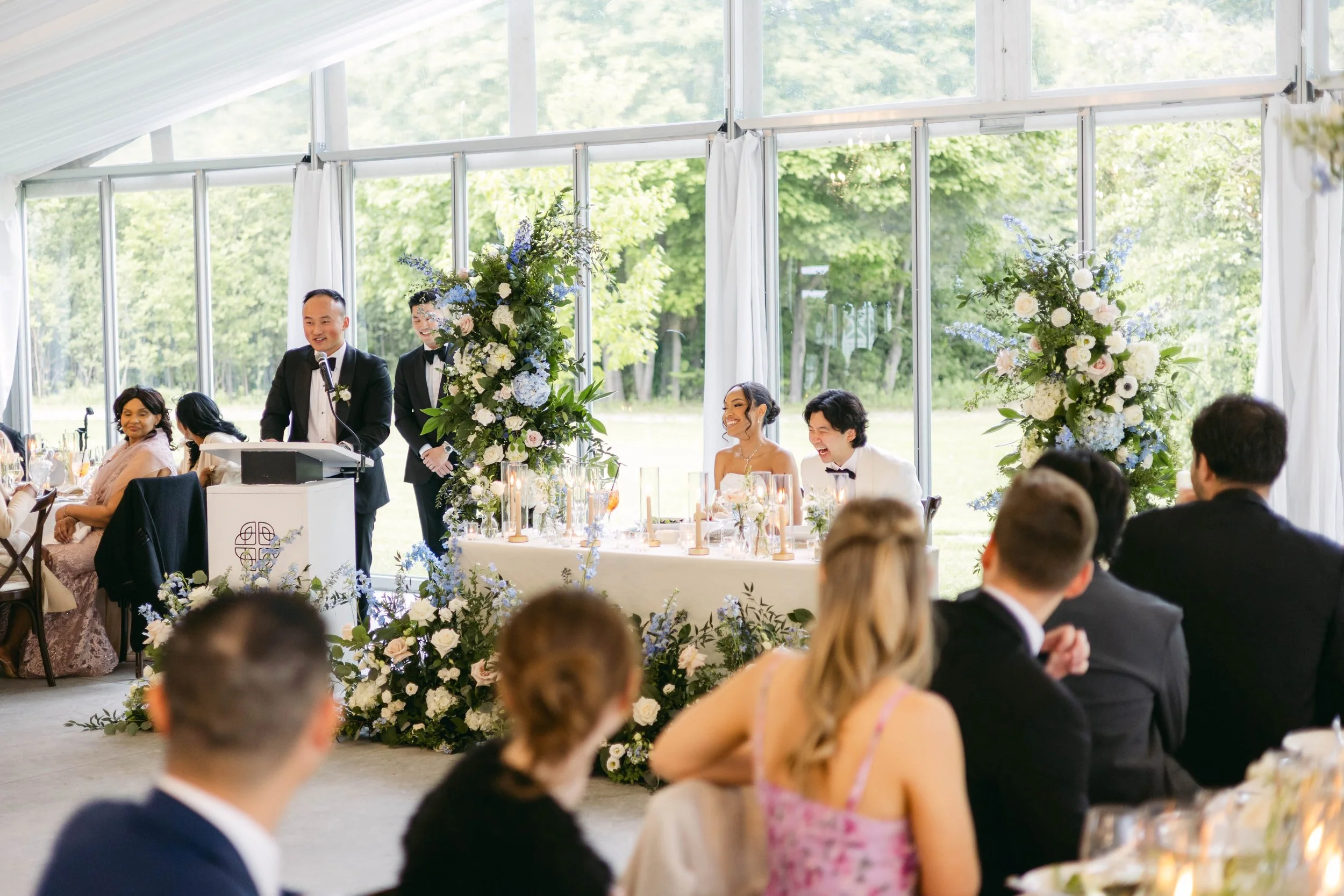 Family members giving wedding speeches during an elegant reception planned by Events by Whim.