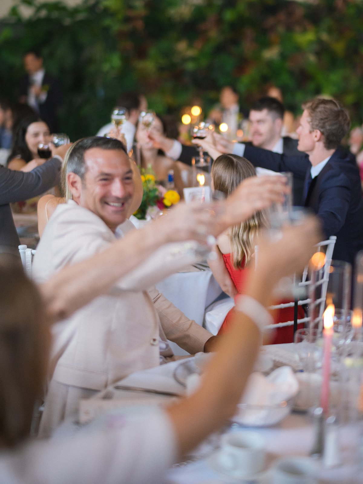 Wedding guests being welcomed with champagne during cocktail hour at a luxury Toronto wedding planned by Events by Whim at the Royal Botanical Gardens in Burlington Ontario