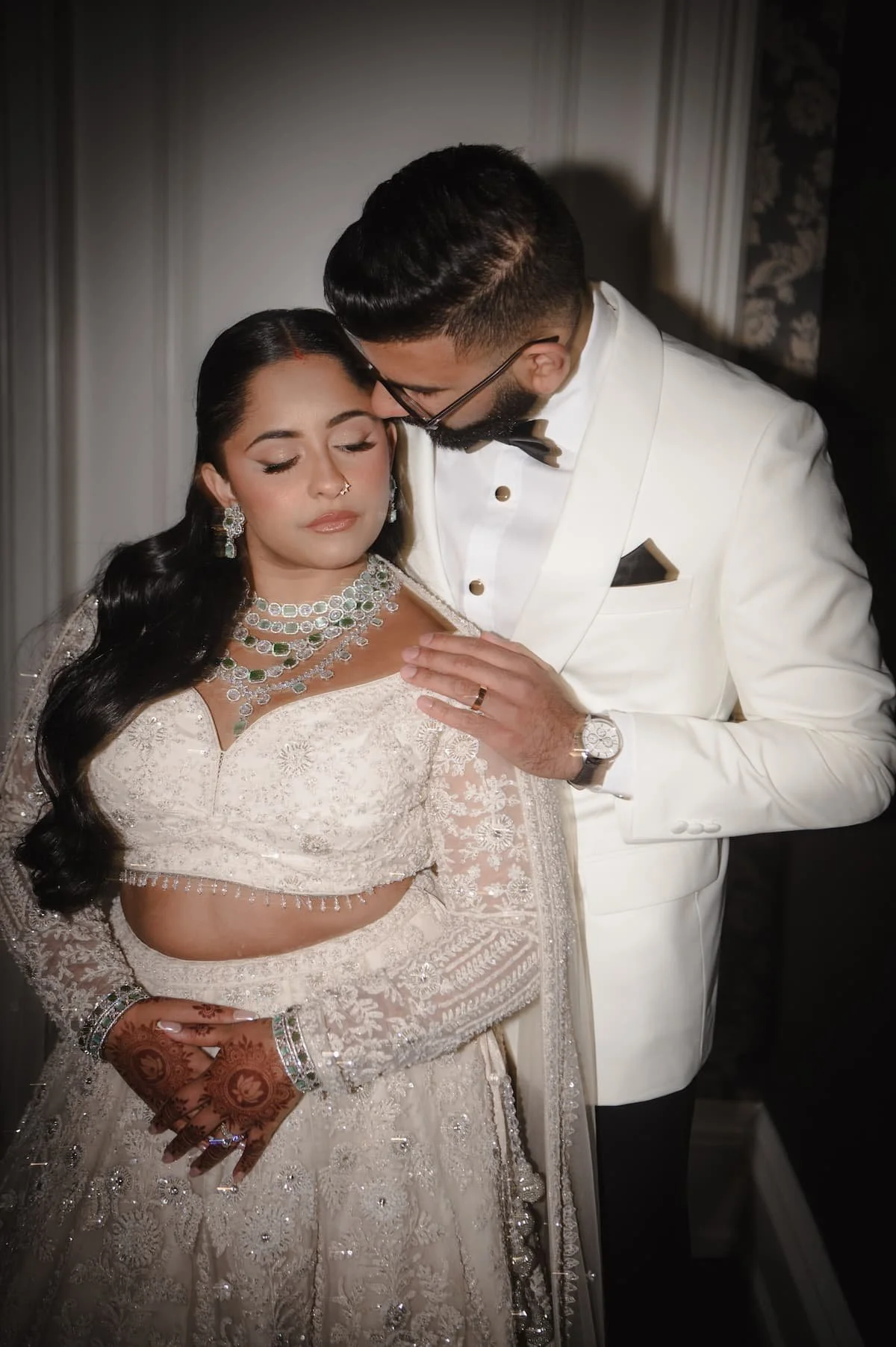 South Asian newlyweds taking editorial portraits at wedding reception at Arlington Estate