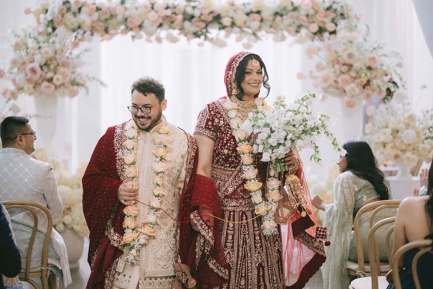 Multicultural fusion couple during their Hindu wedding ceremony at Ricarda's in Toronto, planned and designed by Events by Whim.