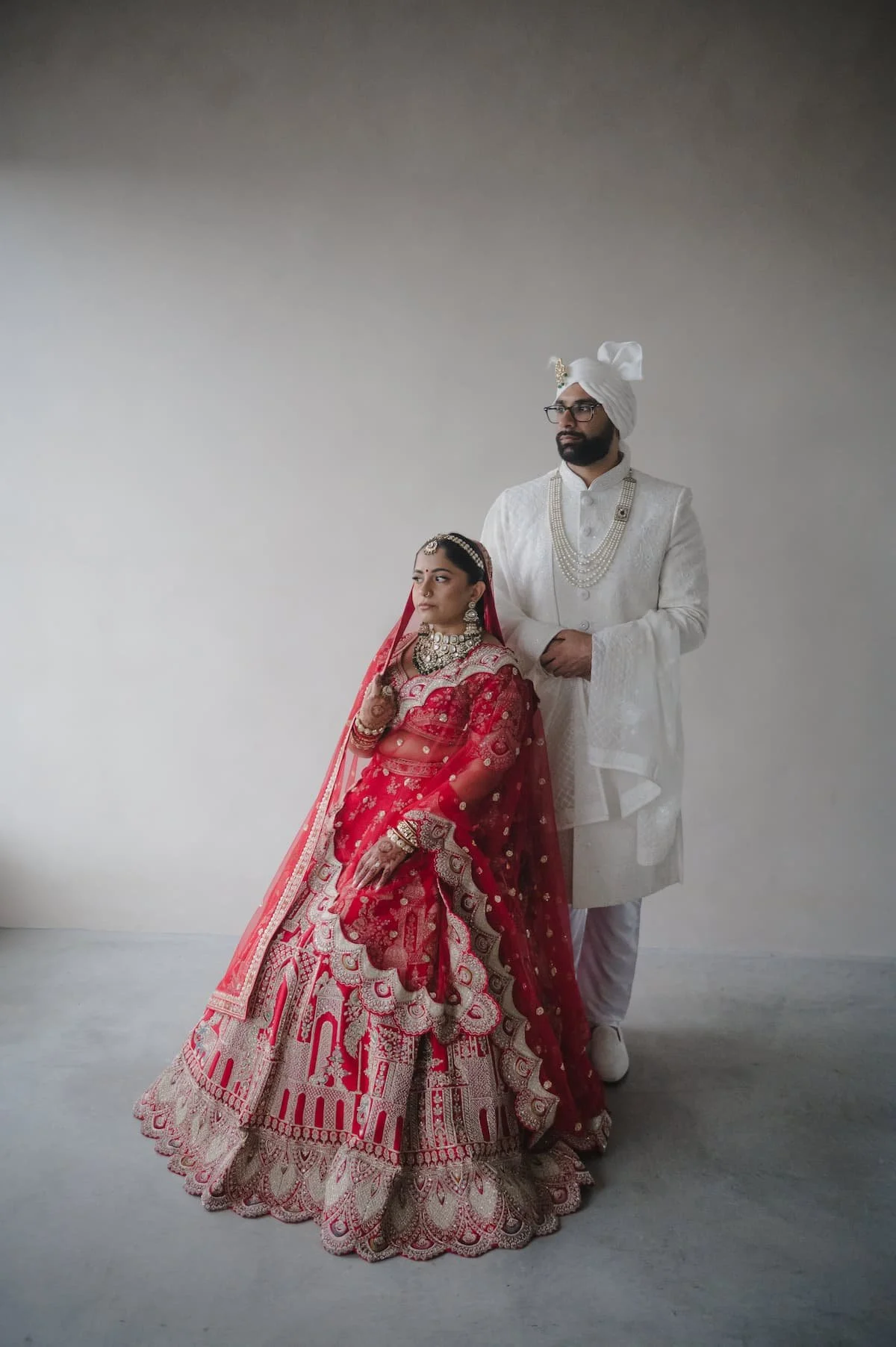 Ashika and Sagar during their first-look portraits at Bloom Studios before their Sikh wedding ceremony at Arlington Estate.