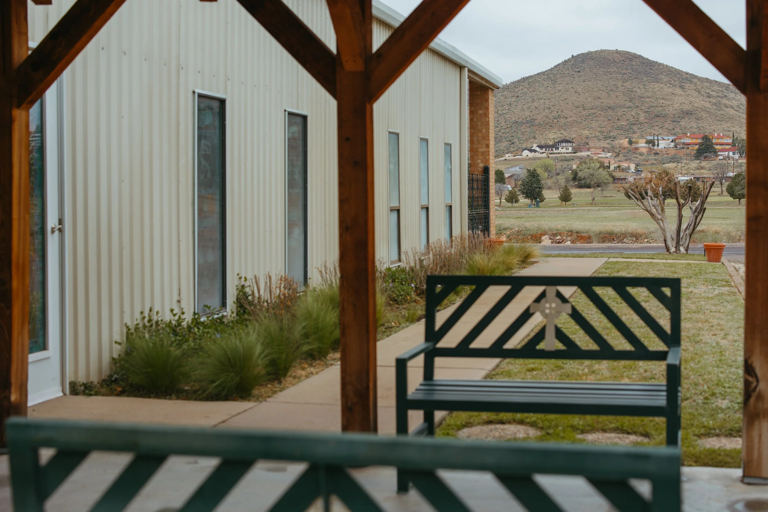 HOLY CROSSOutsidePorchBenches.jpg