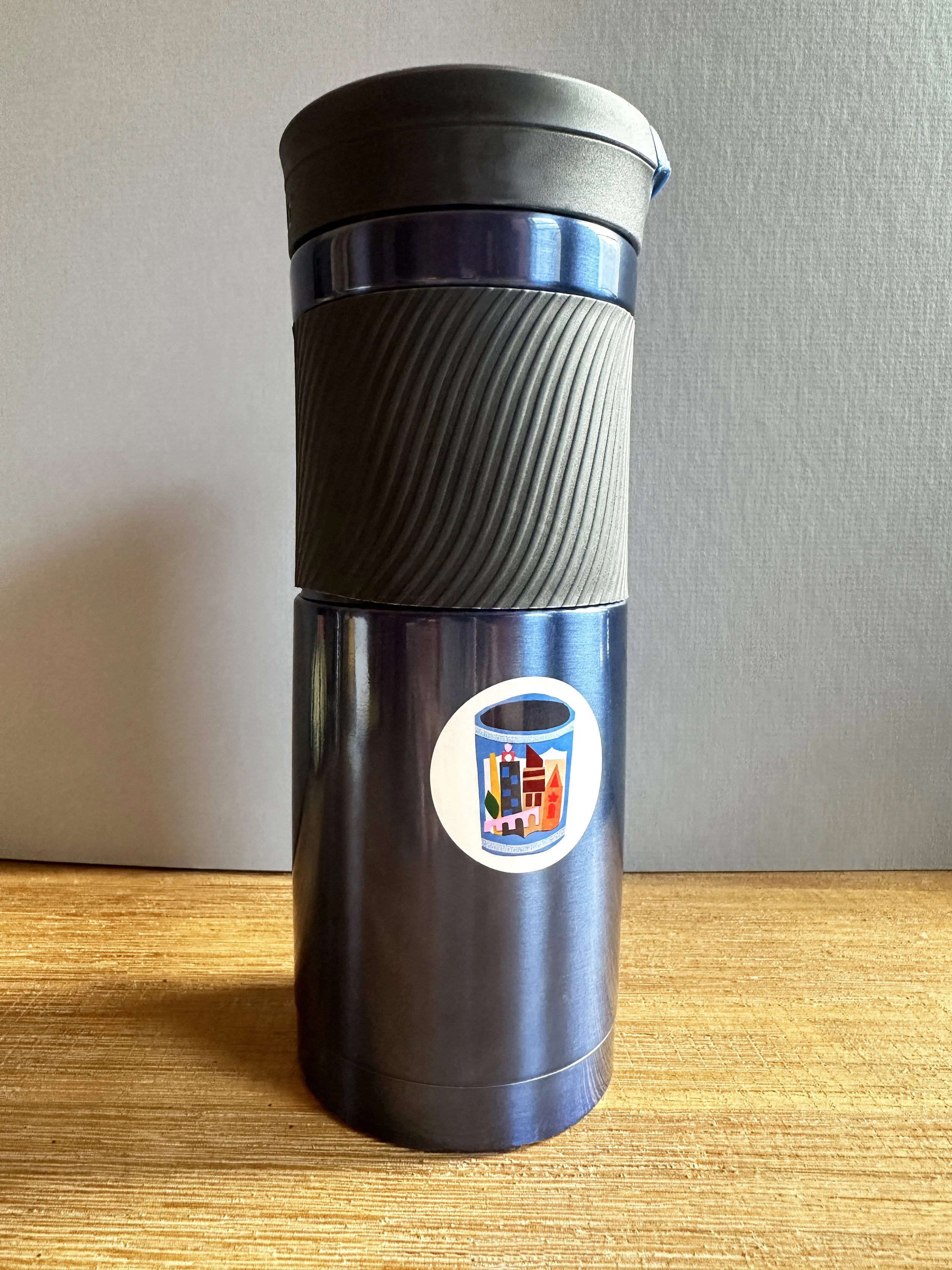 Coffee thermos with sticker.jpg