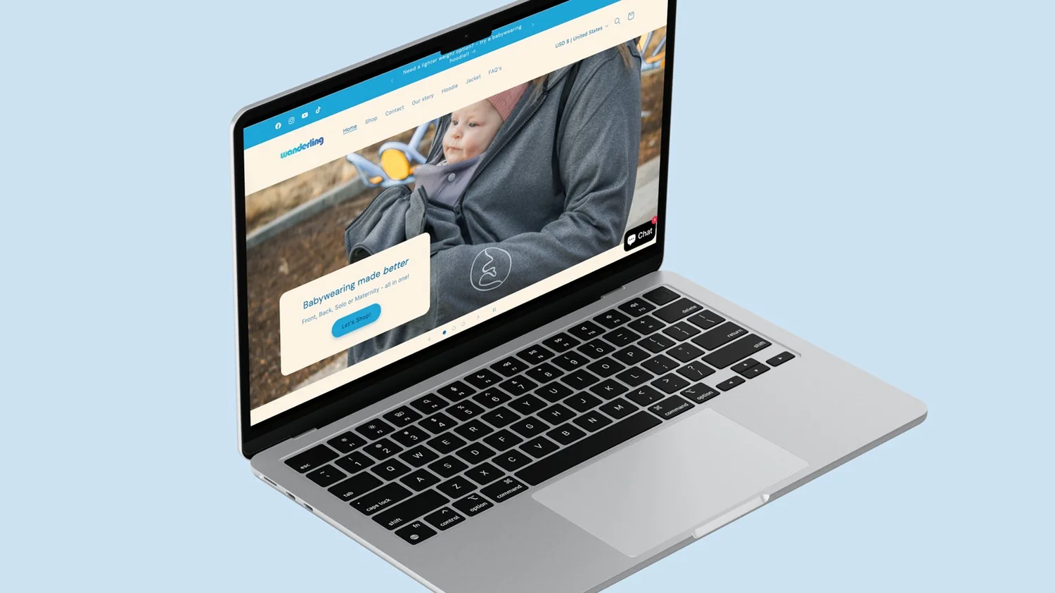 Shopify homepage with babywearing photography