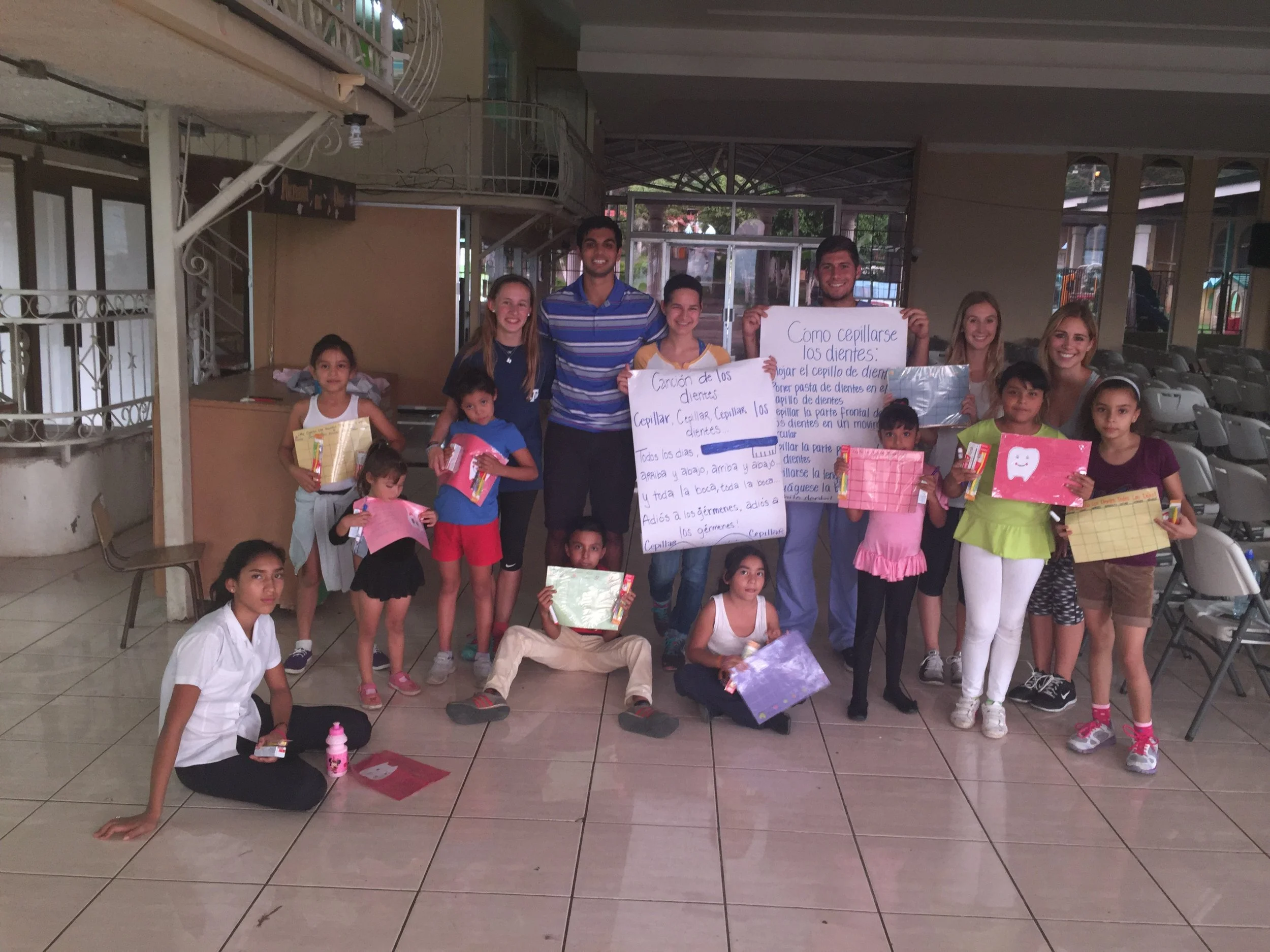 Danny Ashley teaching with student health volunteers