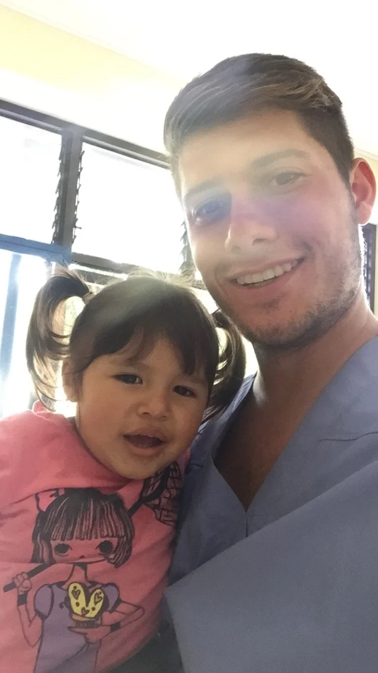 Danny Ashley with a patient in Costa Rica