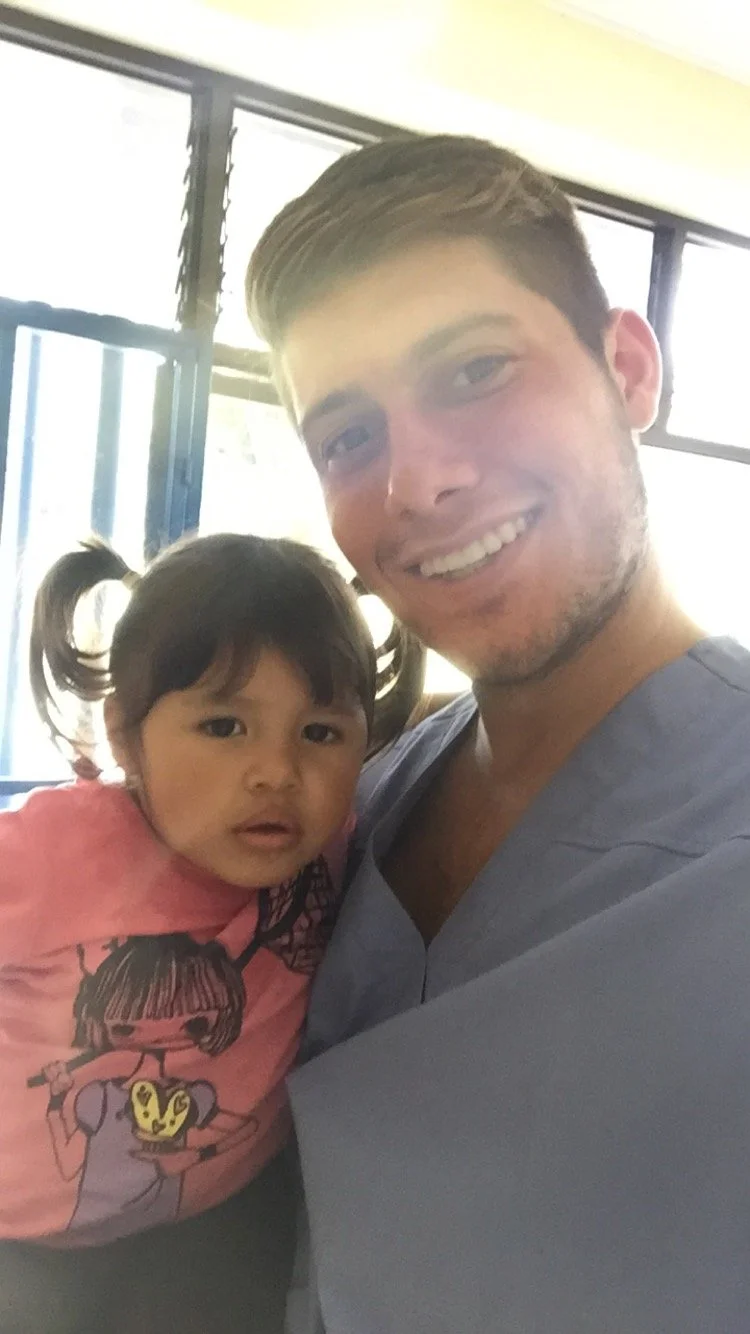 Danny Ashley with a patient in Costa Rica