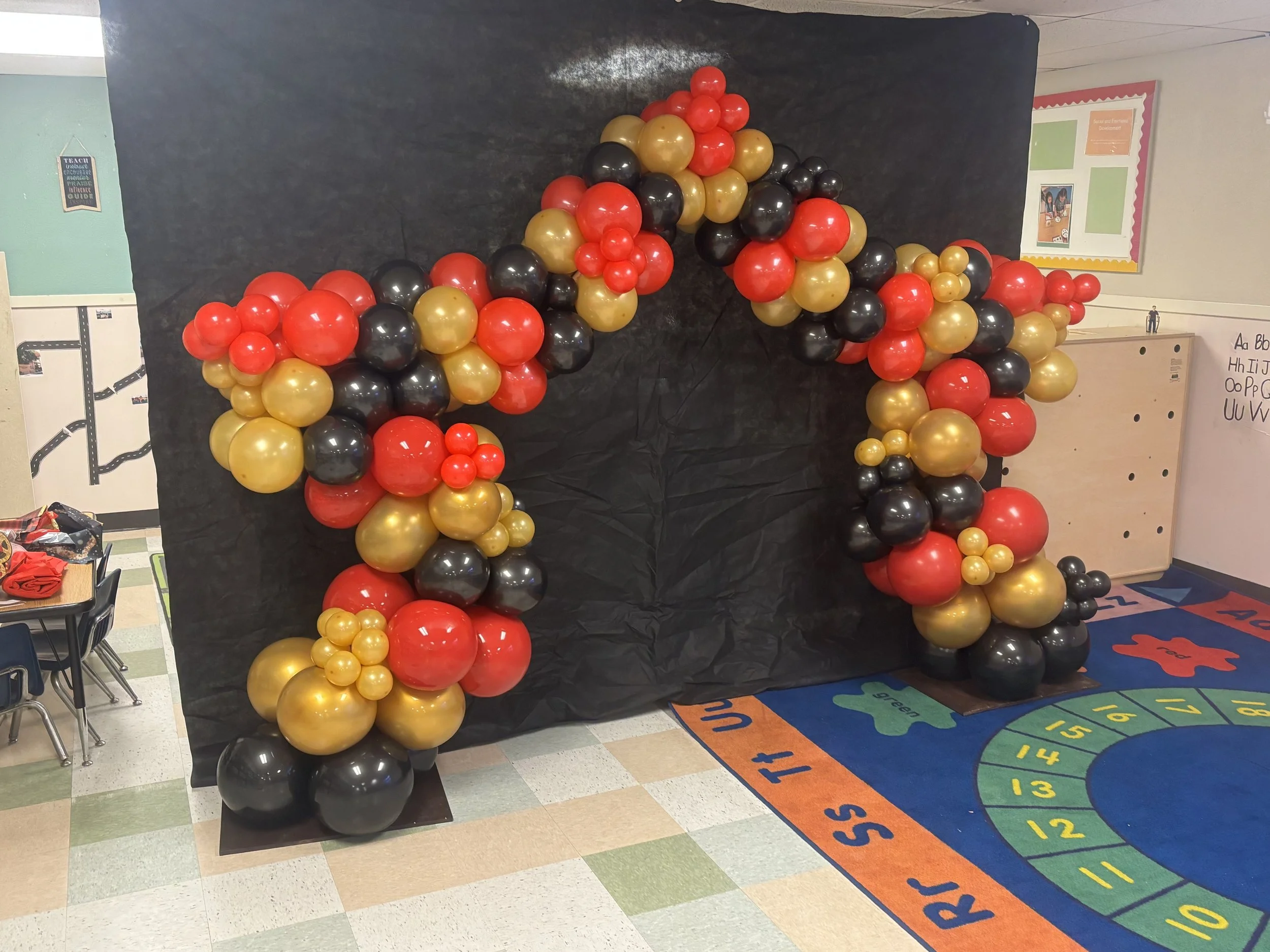 Star Arch was built custom just for this event! Theme was Old Hollywood and we laid out the red carpet for these littles!