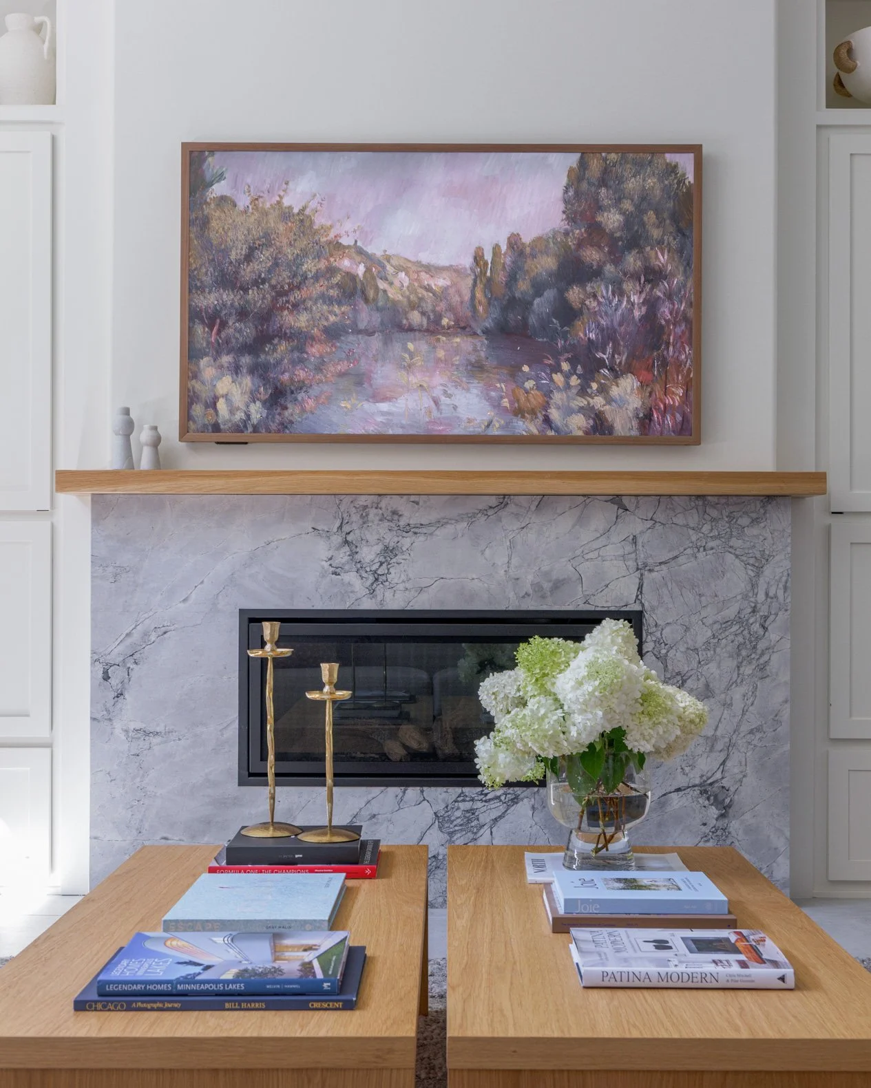 modern-fireplace-with-marble-surround-and-wood-ledge.jpg