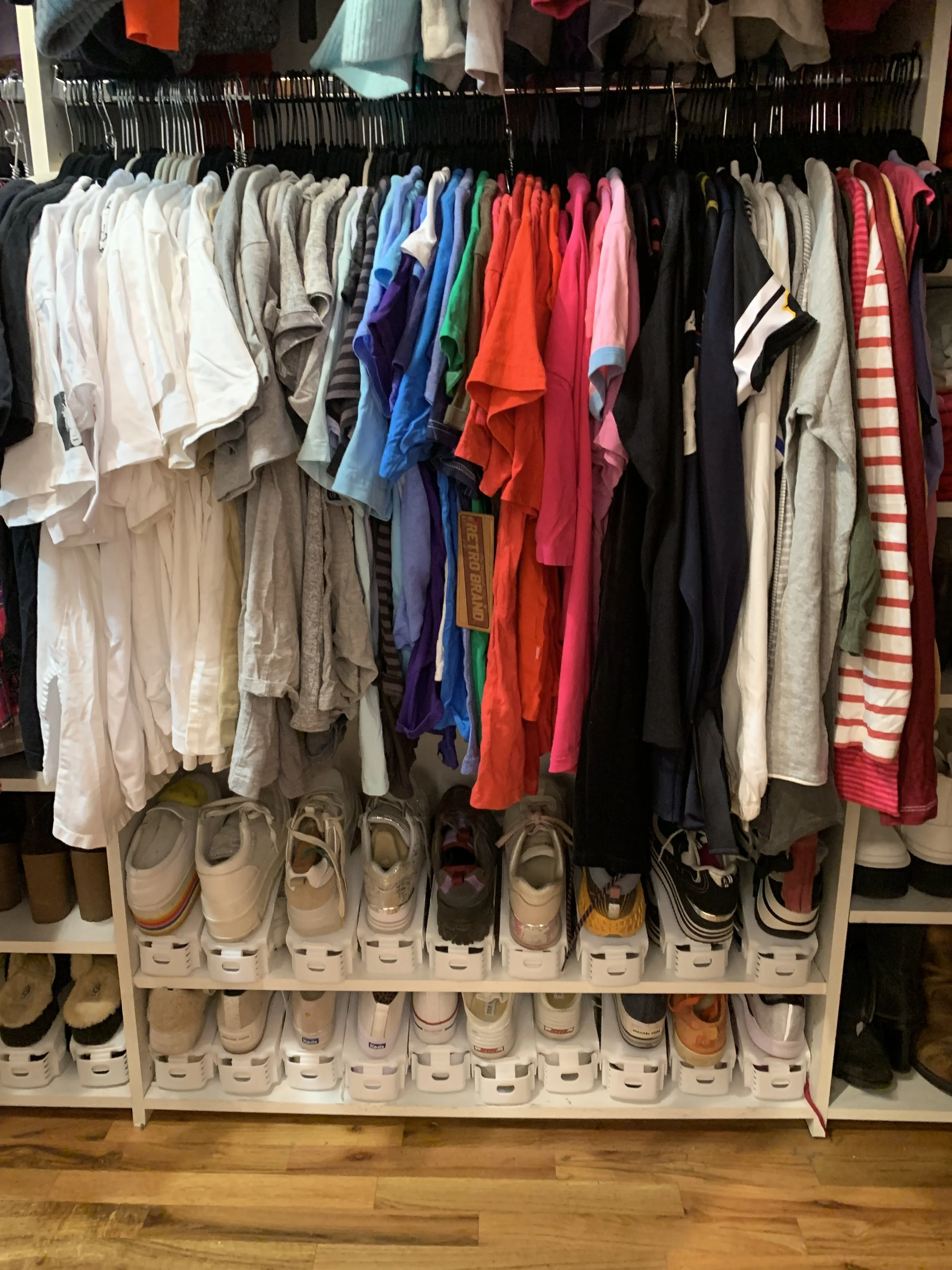 Boutique style shoe shelving layout by Happy Organized Denver