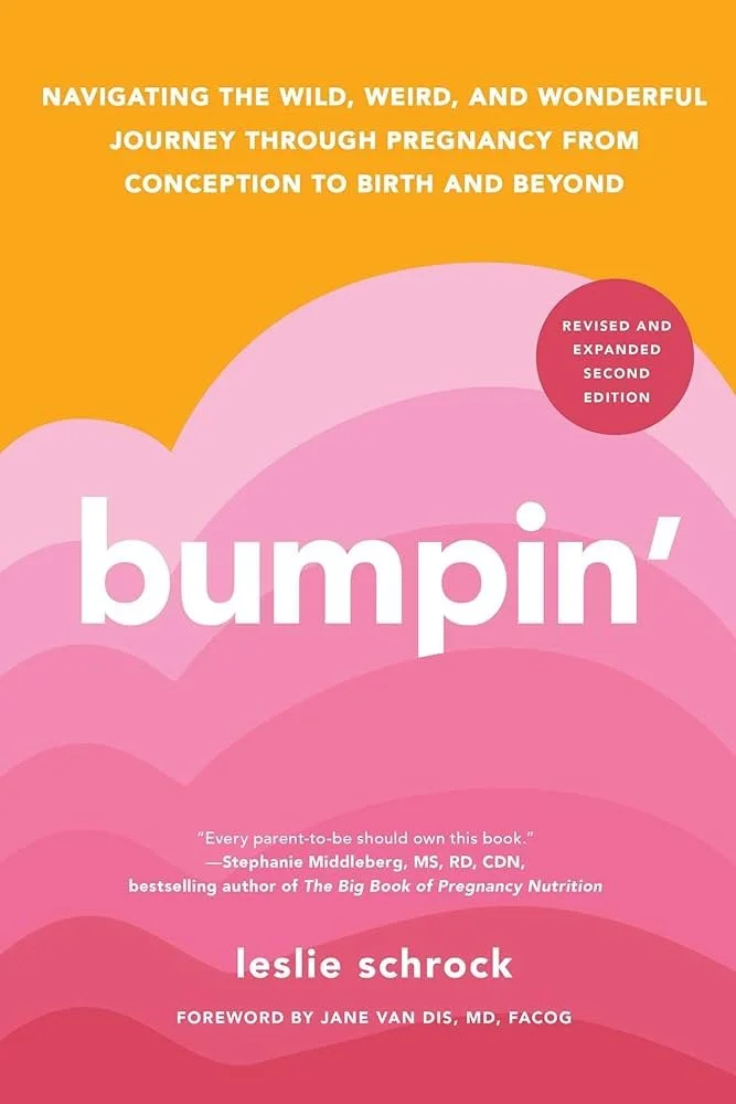 Book cover for "Bumpin" by Leslie Schrock featuring pink and orange colors with a wave pattern and text indicating it is a comprehensive pregnancy journey guide.