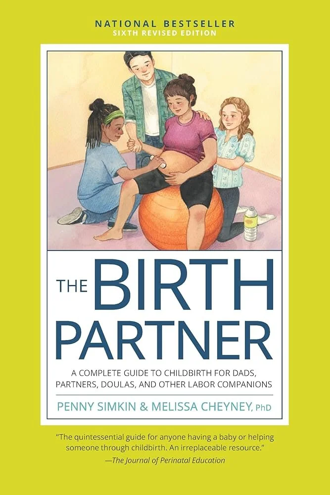 Book cover of 'The Birth Partner' with an illustration of a diverse group of women and a man supporting a pregnant woman during childbirth, sitting on an exercise ball, with a water bottle nearby.