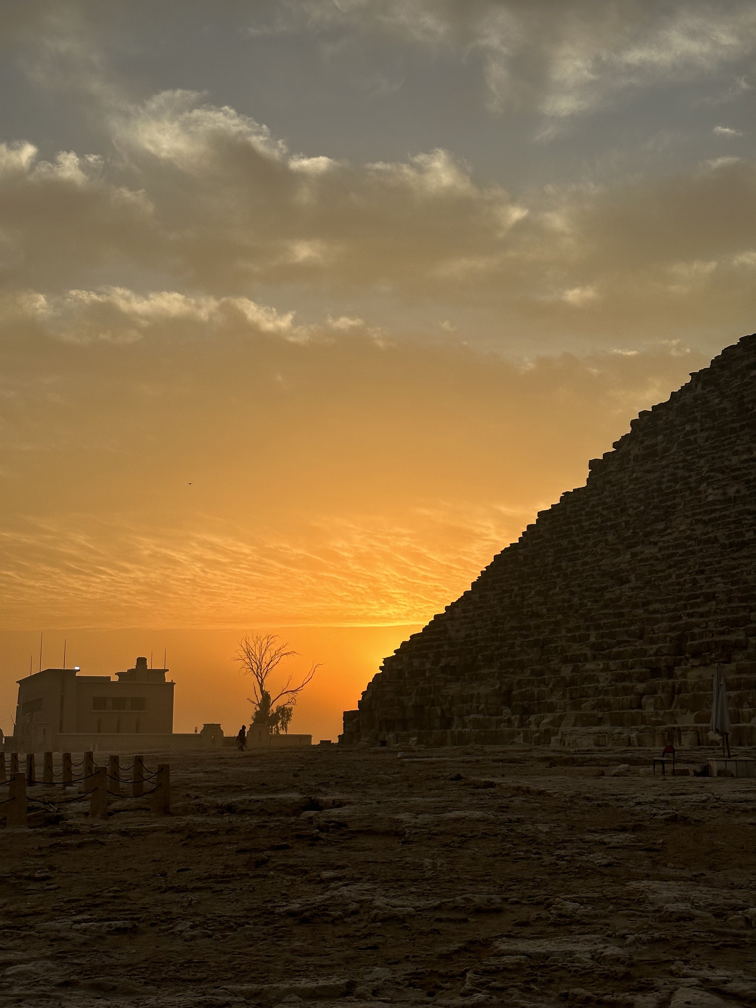Golden sunset behind the Great Pyramid