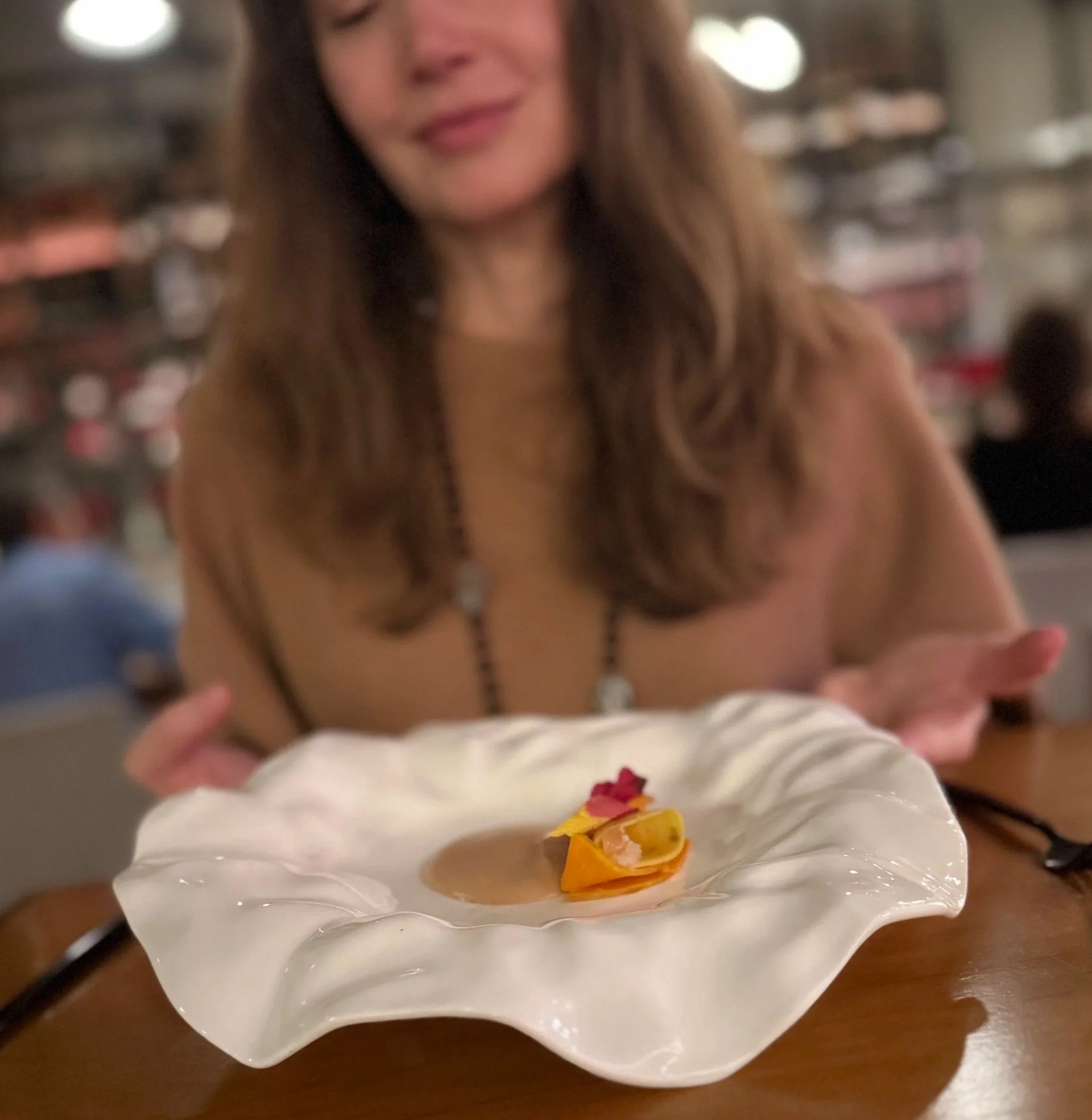 Minimalist plated dish emphasizing composition and restraint at Mixtli in San Antonio