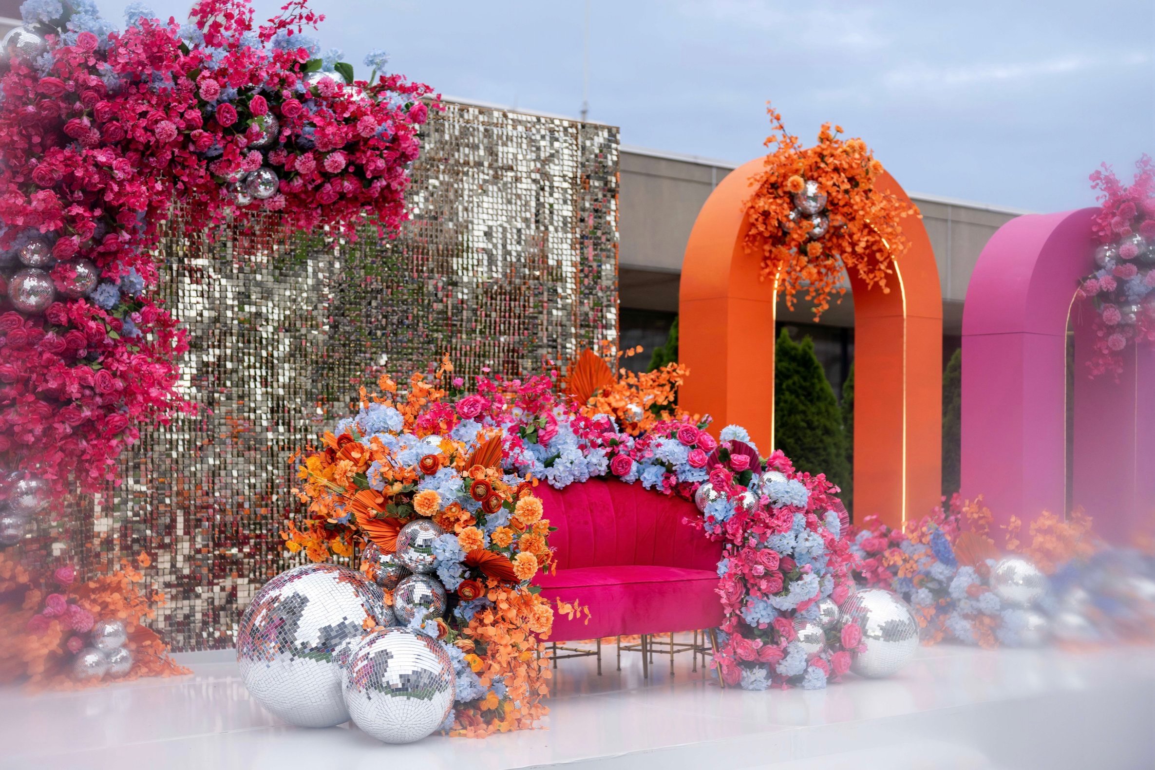 Indian Wedding Sangeet Decor Disco Balls, Orange and Pink Arches, Flowers, Disco Ball Shimmery Wall Marriott Springfield Massachusetts New England