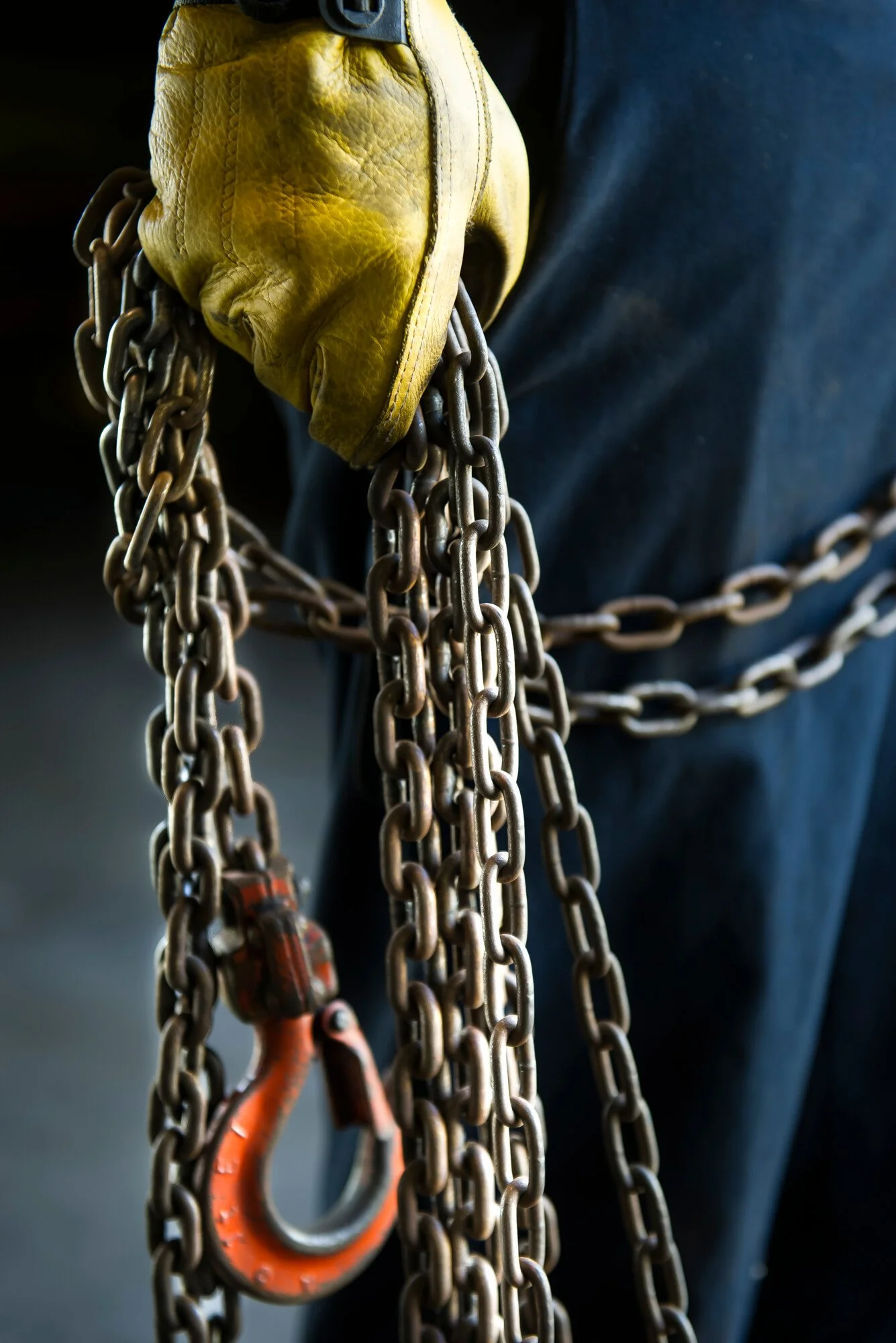Hand holding a chain photographed for a San Diego industrial photography assignment for Alta Energy