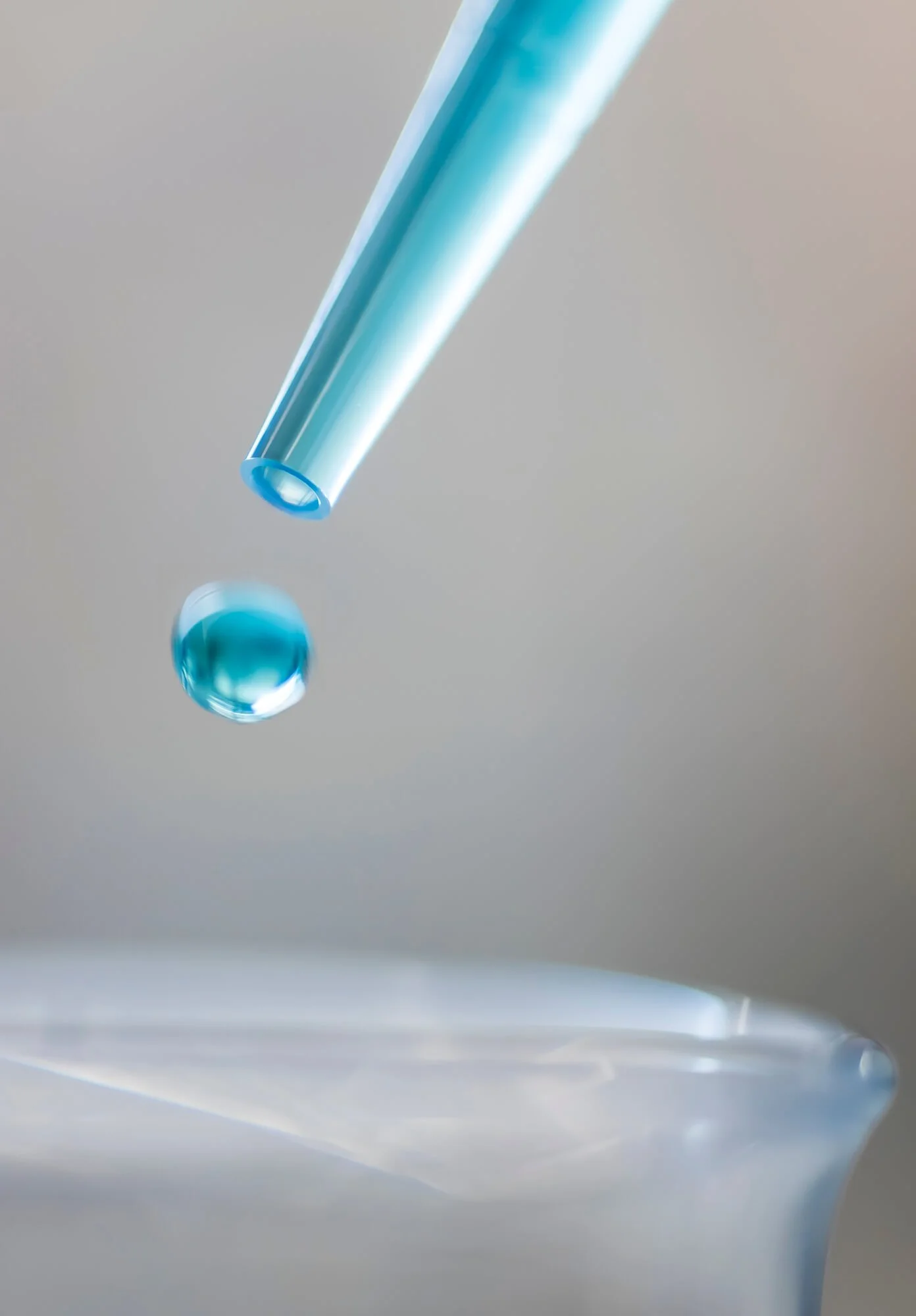 A pippette droplet falling into a beaker. Shot for a Biotech assignment in San Diego–Ed Carreon Photography