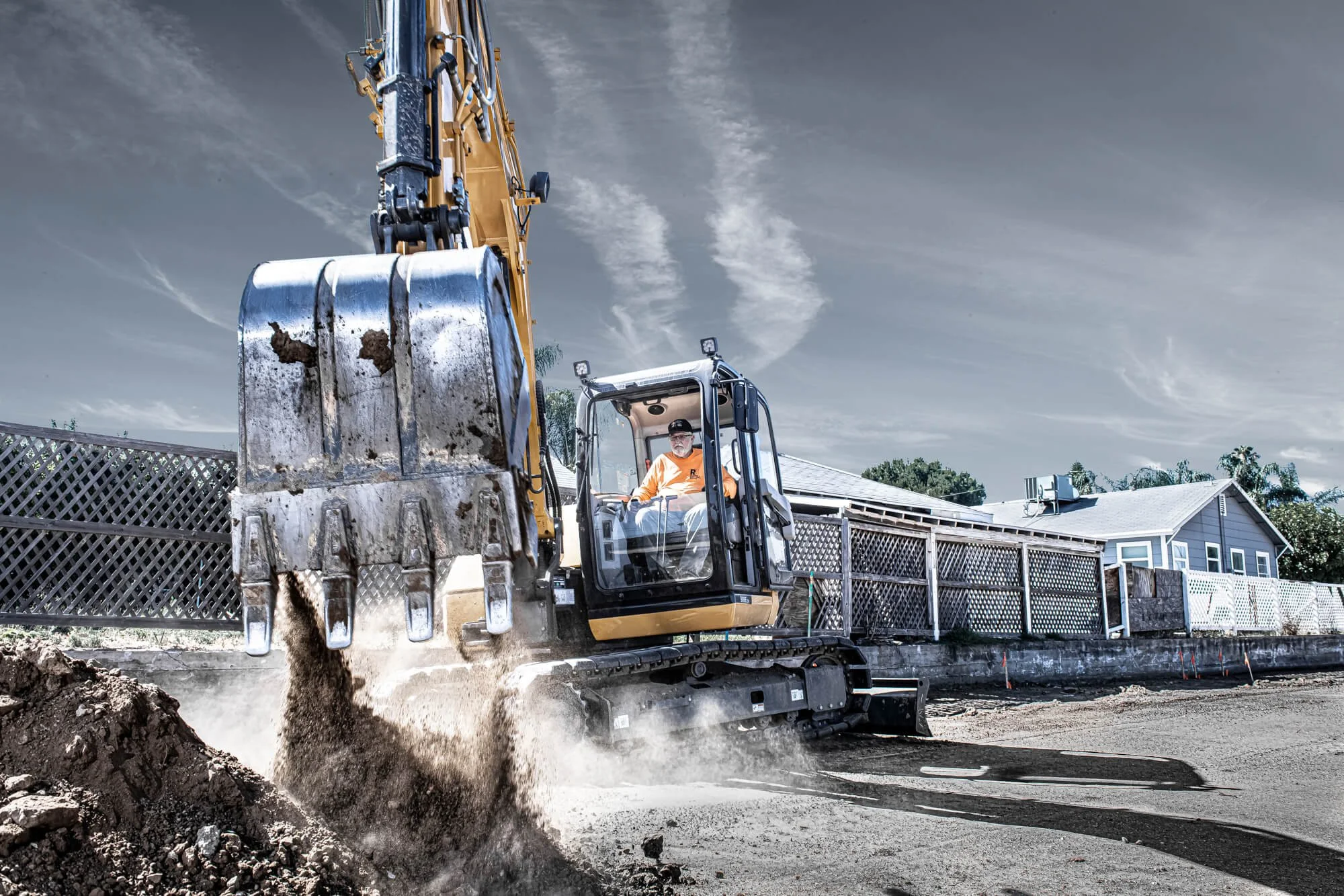 Operator performing trenchingn operation for construction site in San Diego