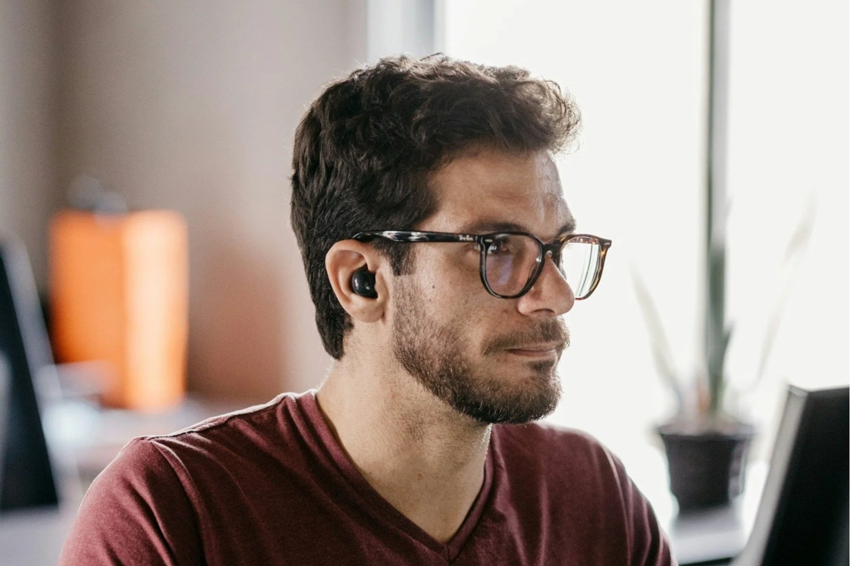 Eyeglasses resting on a desk, symbolizing the administrative and billing work TE-Billing Solutions helps streamline.