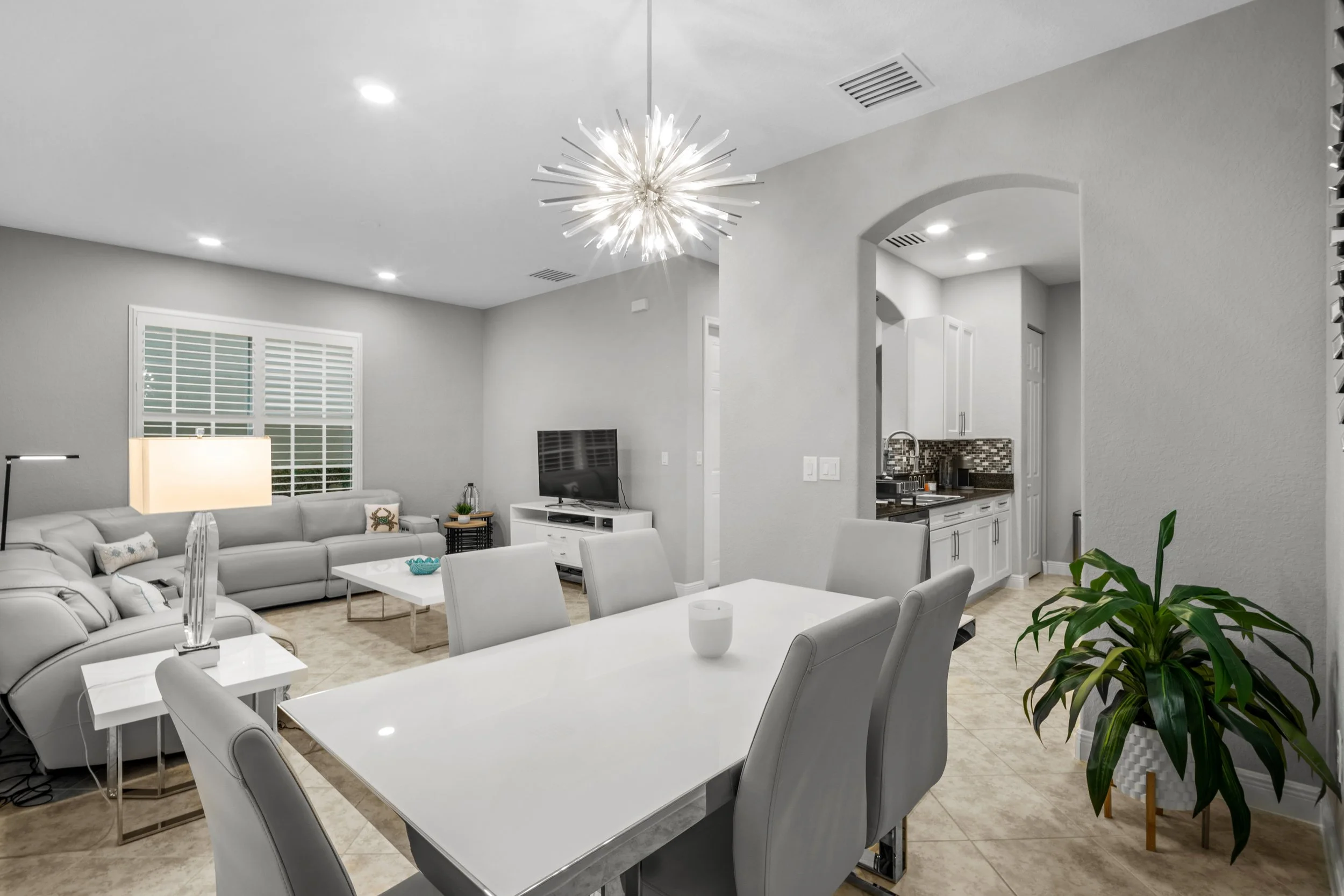 South Florida real estate photography bright living room and dining area.