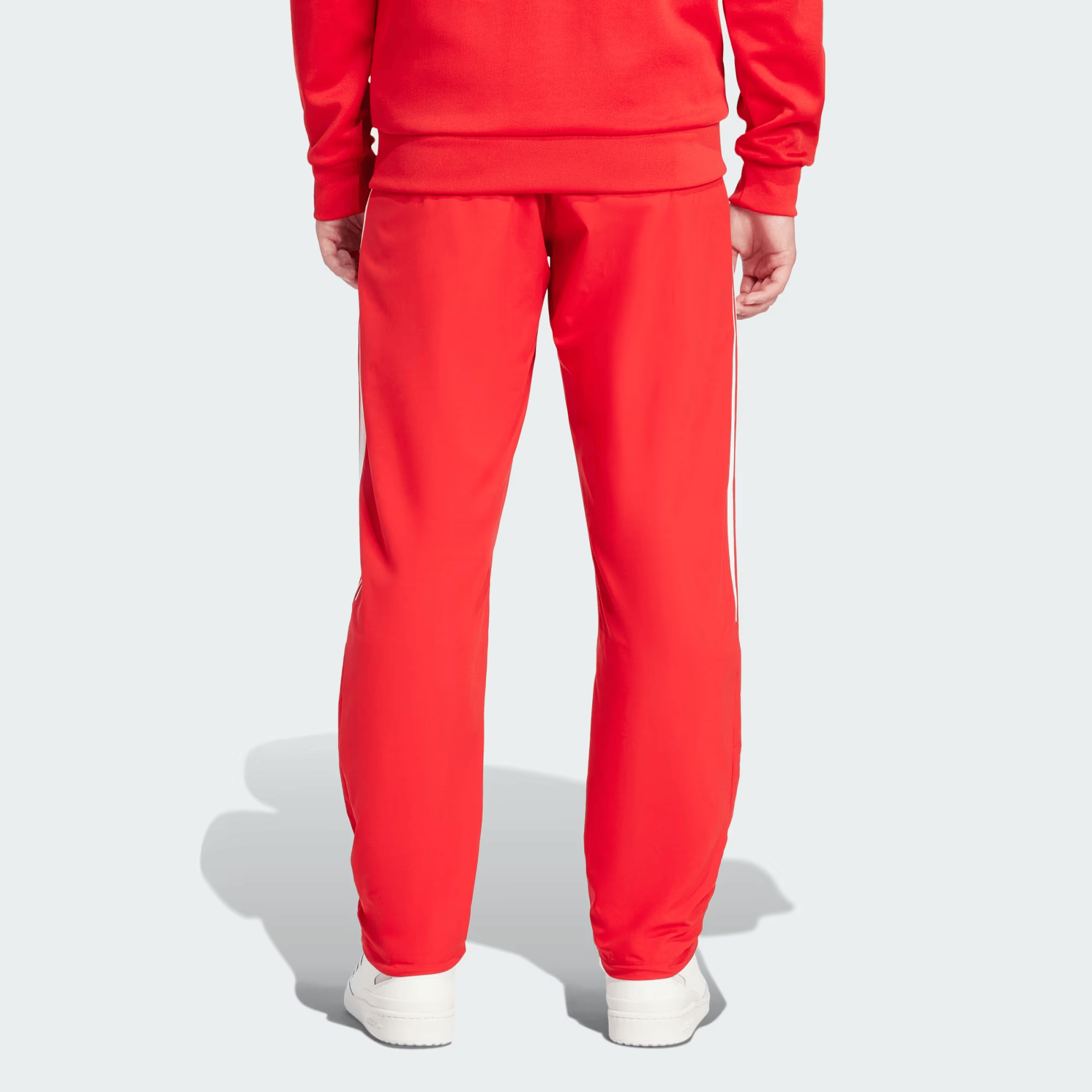 Adicolor_Teamgeist_Track_Pants_Red_JP1118_23_hover_model.png