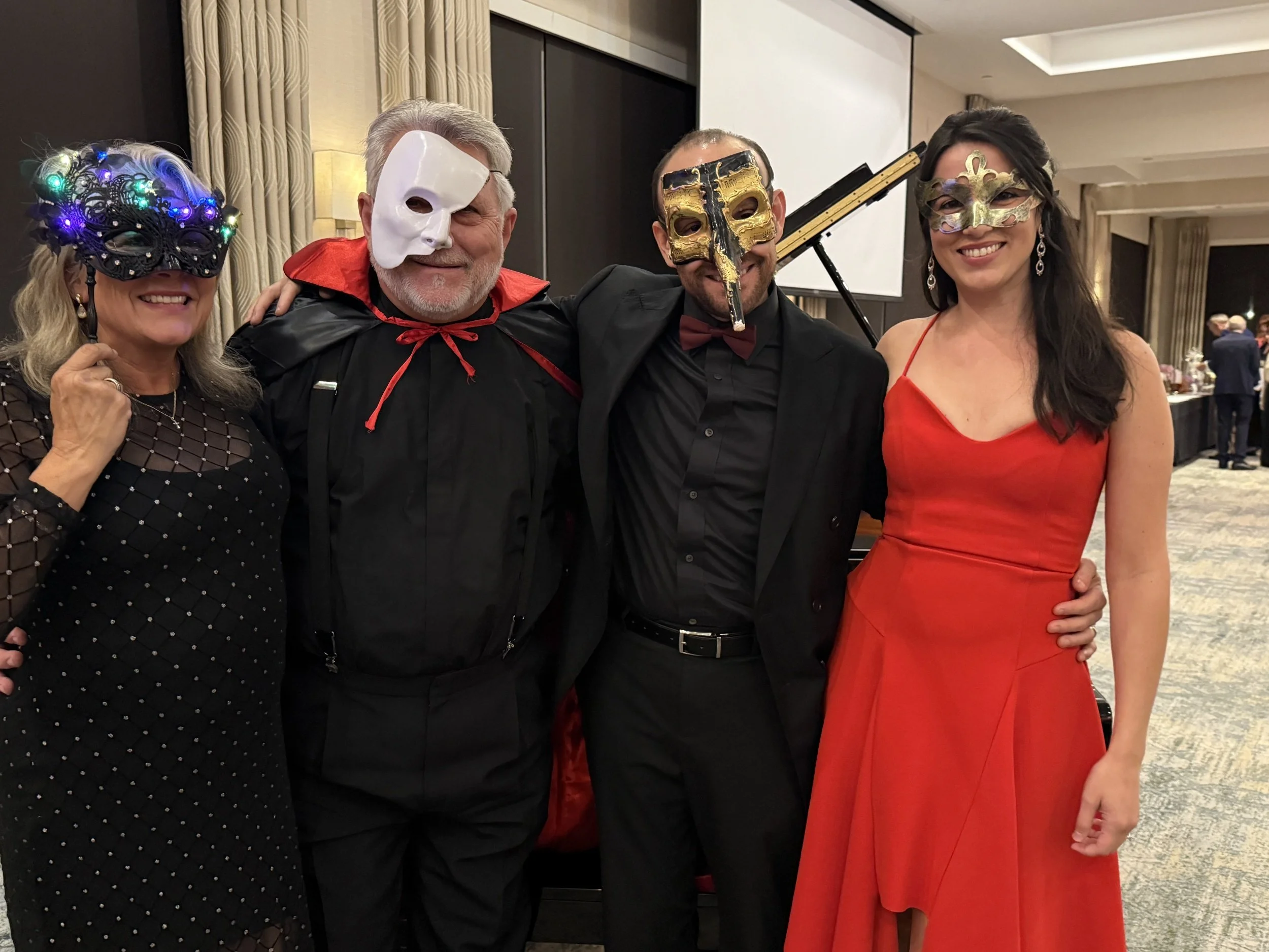 Kimberlee, Mark, Erikson and Diandra in their masks