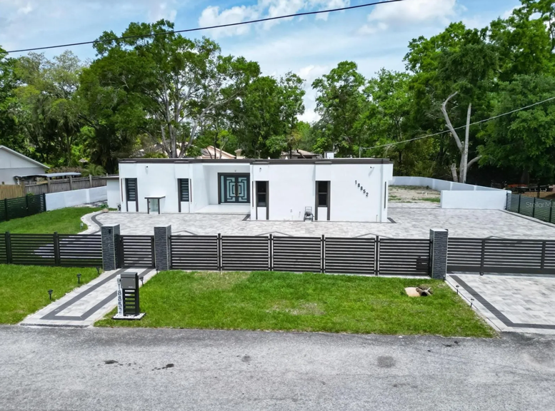 Lakefront Luxury Meets Turn-Key Living | 18852 Tracer Dr, Lutz, FL 33549