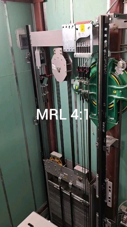 Machine room less (MRL) traction elevator with 4:1 roping.
The most common roping method in the least century have been 1:1, meaning that each rotation on the drive sheave equals that amount of movement in the load. This requires more powerful moto