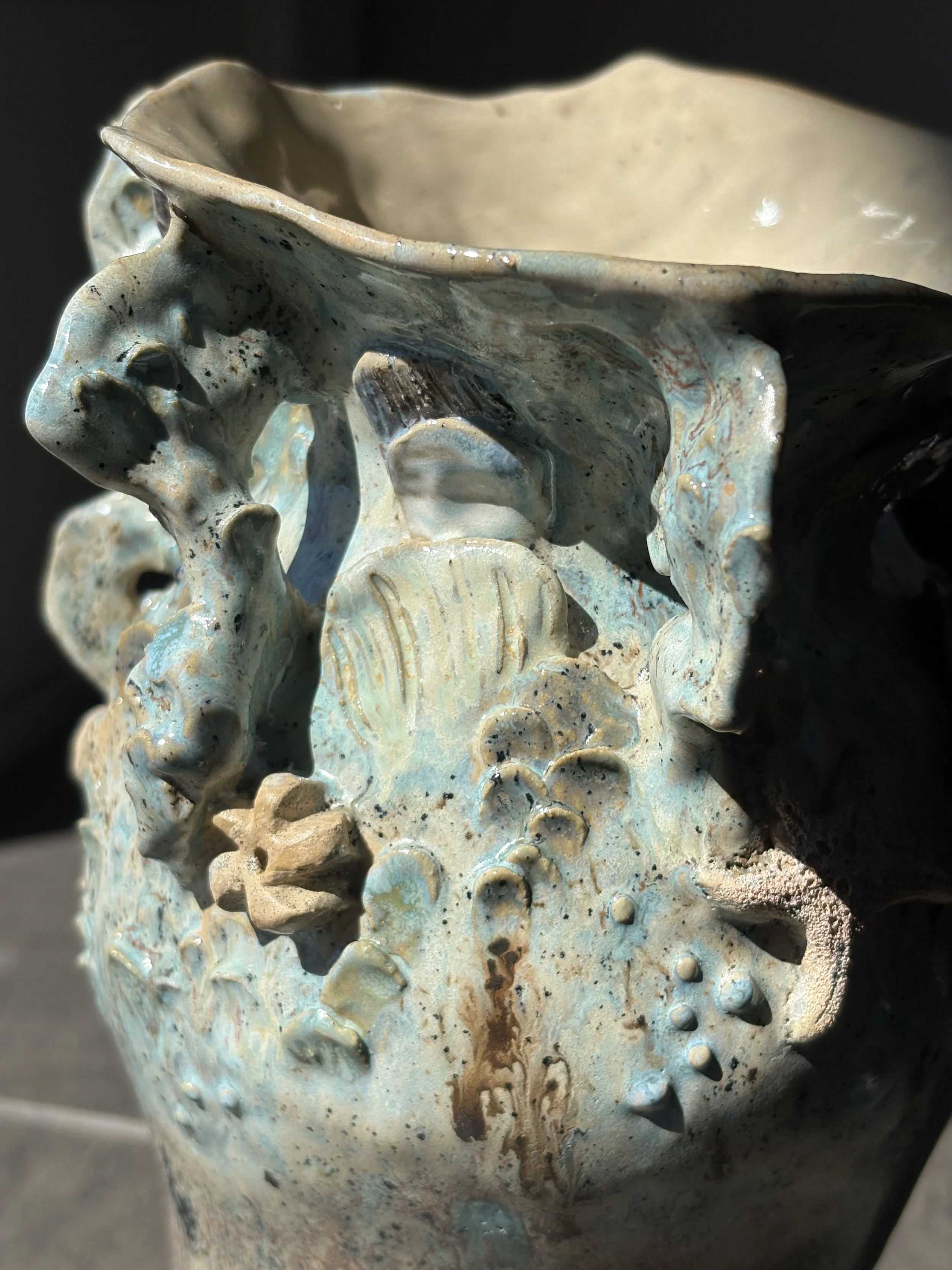 Up close image of stoneware vase inspired by the oceans