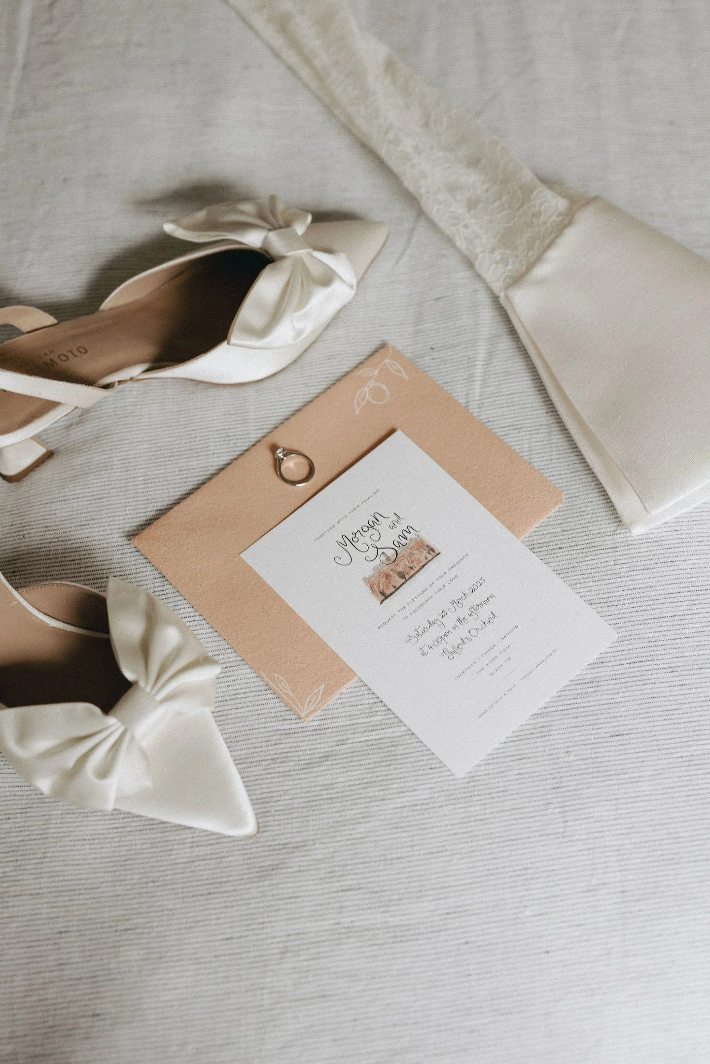 Delicate details and soft textures to set the tone &mdash; Morgan&rsquo;s morning began with quiet beauty. Silk bows, hand-scripted stationery, and heirloom touches hinting at the day to come.