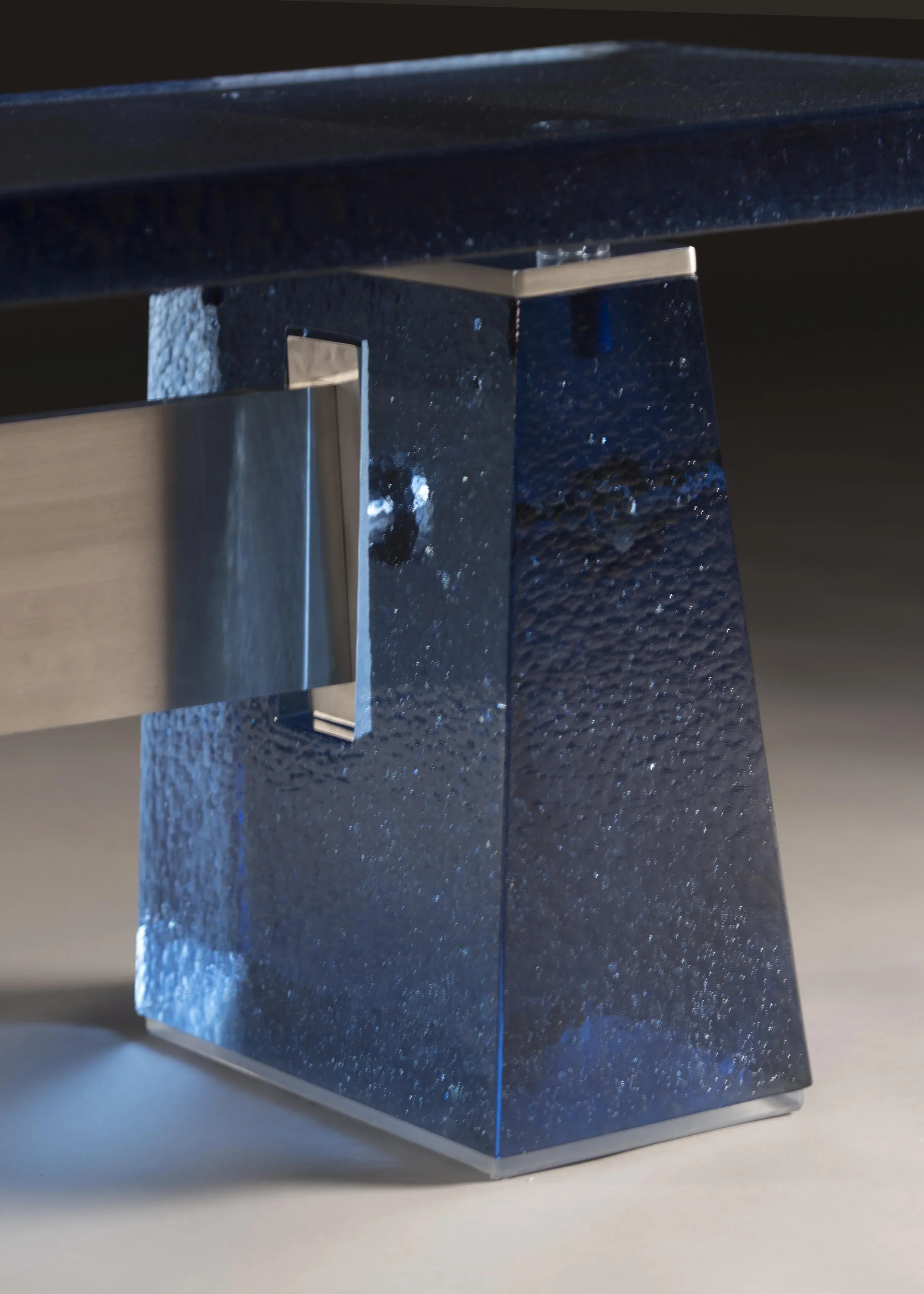 Blue+cast+glass+and+stainless+steel+bench.webp
