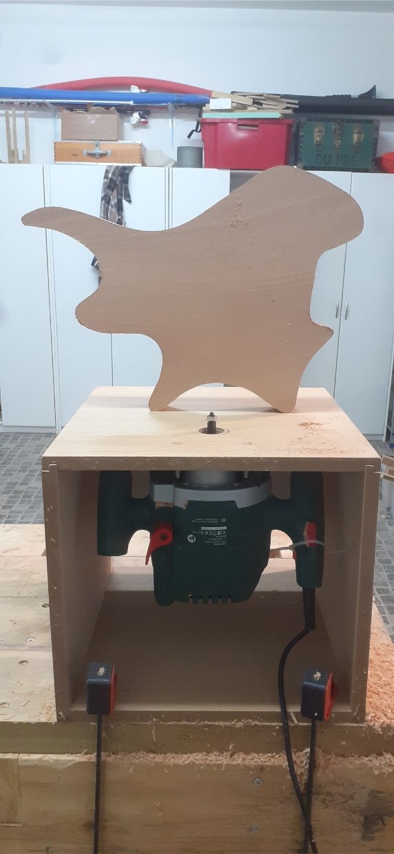The final shape of the body, on my home made router table.