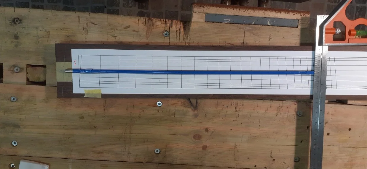 I found website which would calculate the exact positions of the nut, frets and fingerboard dimensions according to the  scale lengths, string spacing and parallel fret position I wanted. This also told me the angle the bridge needed to be. I had thi