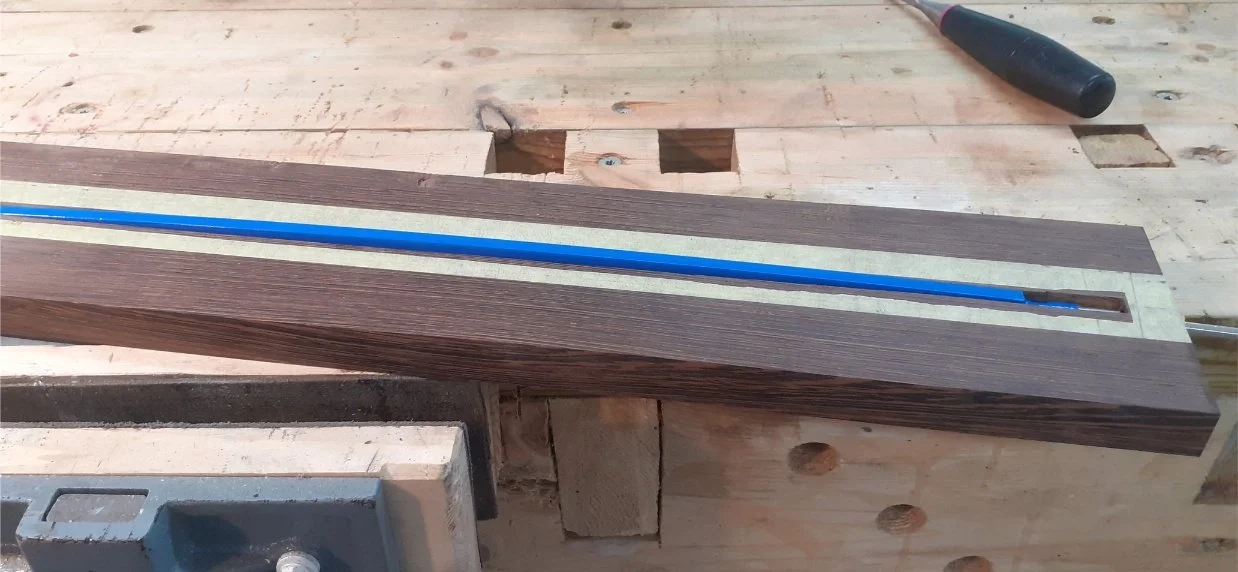 Test fit of the truss rod. I added some tension to check it was bending the right way.