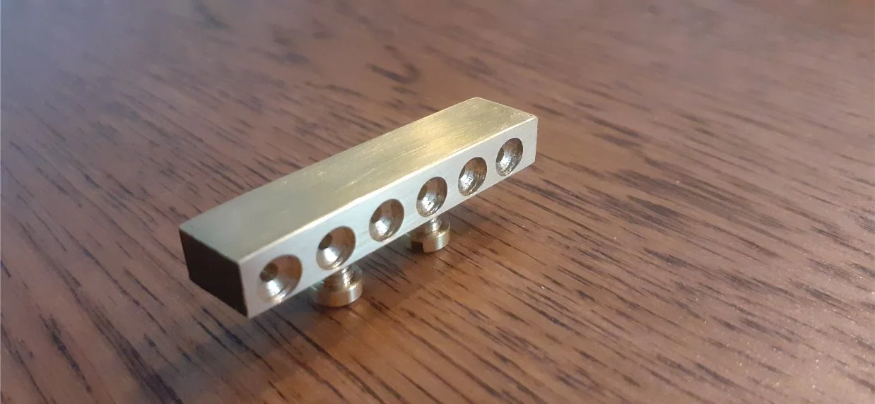 The string retainer. This was custom made by my brother. Thanks Alex! He made a video showing how me made this. 