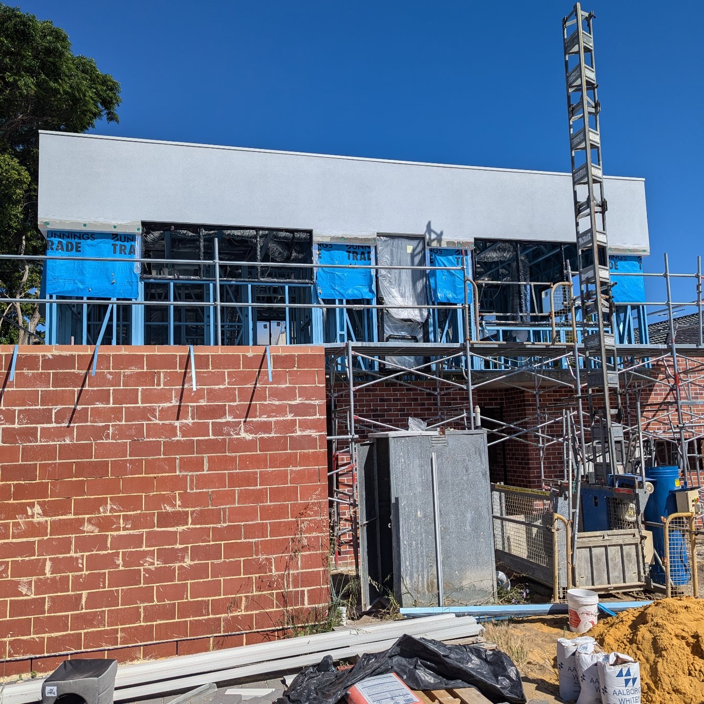 A two storey custom home under construction in Highgate.
Brickwork to the ground floor and metal framing with @masterwall_aus cladding to the upper.