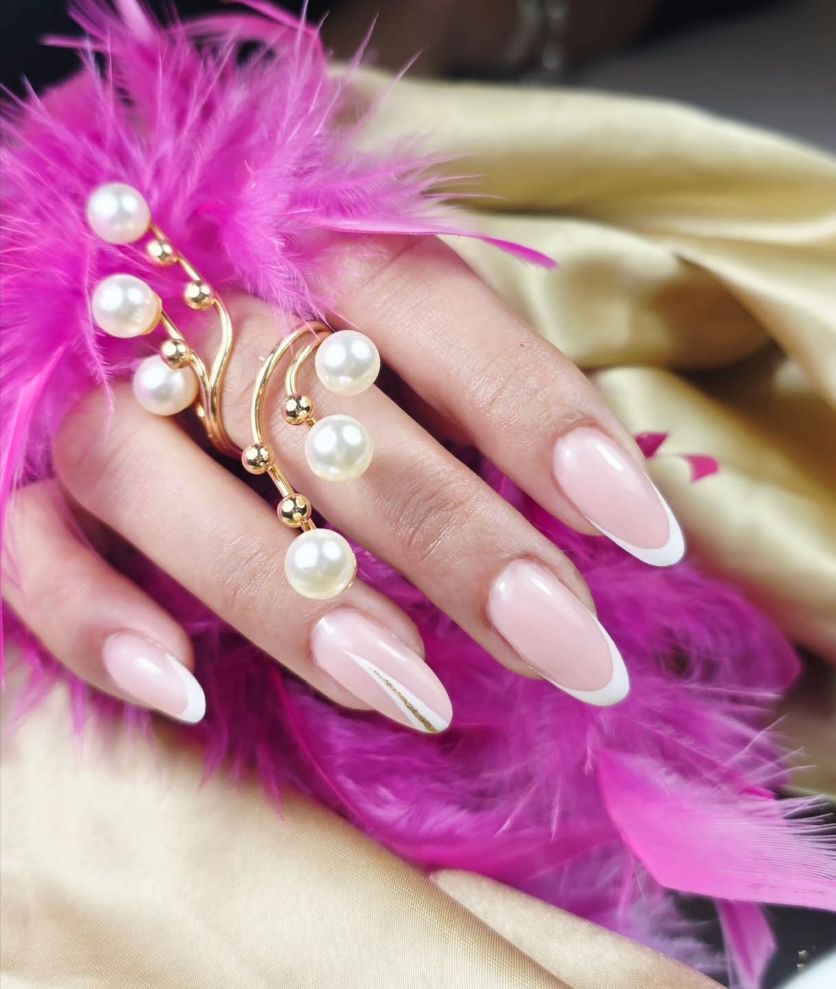 Almond-shaped nails with a soft blush gel, finished with a delicate french tip. A subtle gold accent adds a refined, modern touch to this elegant and timeless look.

Book now 👇
☎️07889256028 Agnieszka 
🌐www.anbeautystudio.co.uk 
📍1a South Street W