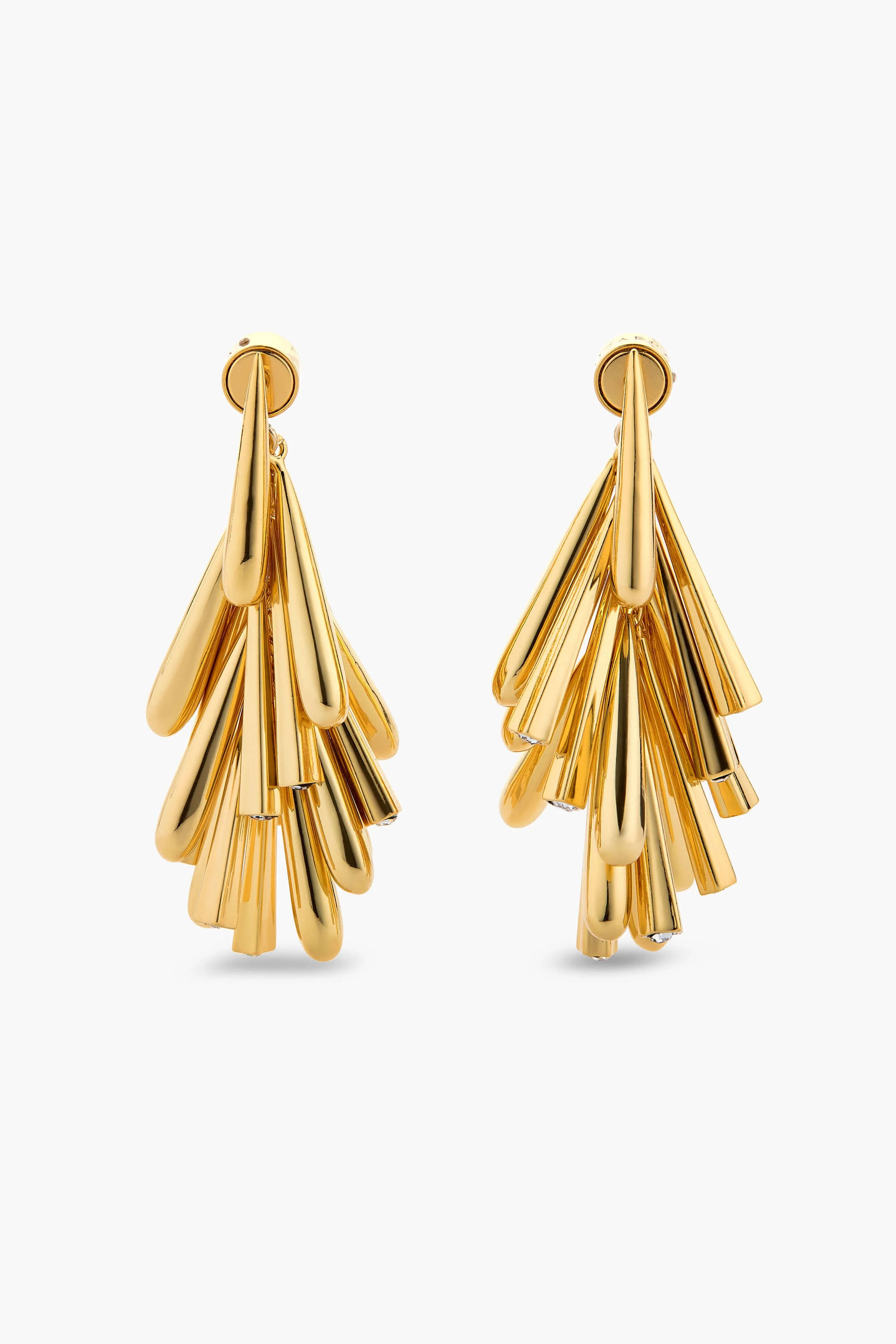 Fashion jewelry photography of gold tassel drop earrings on white background