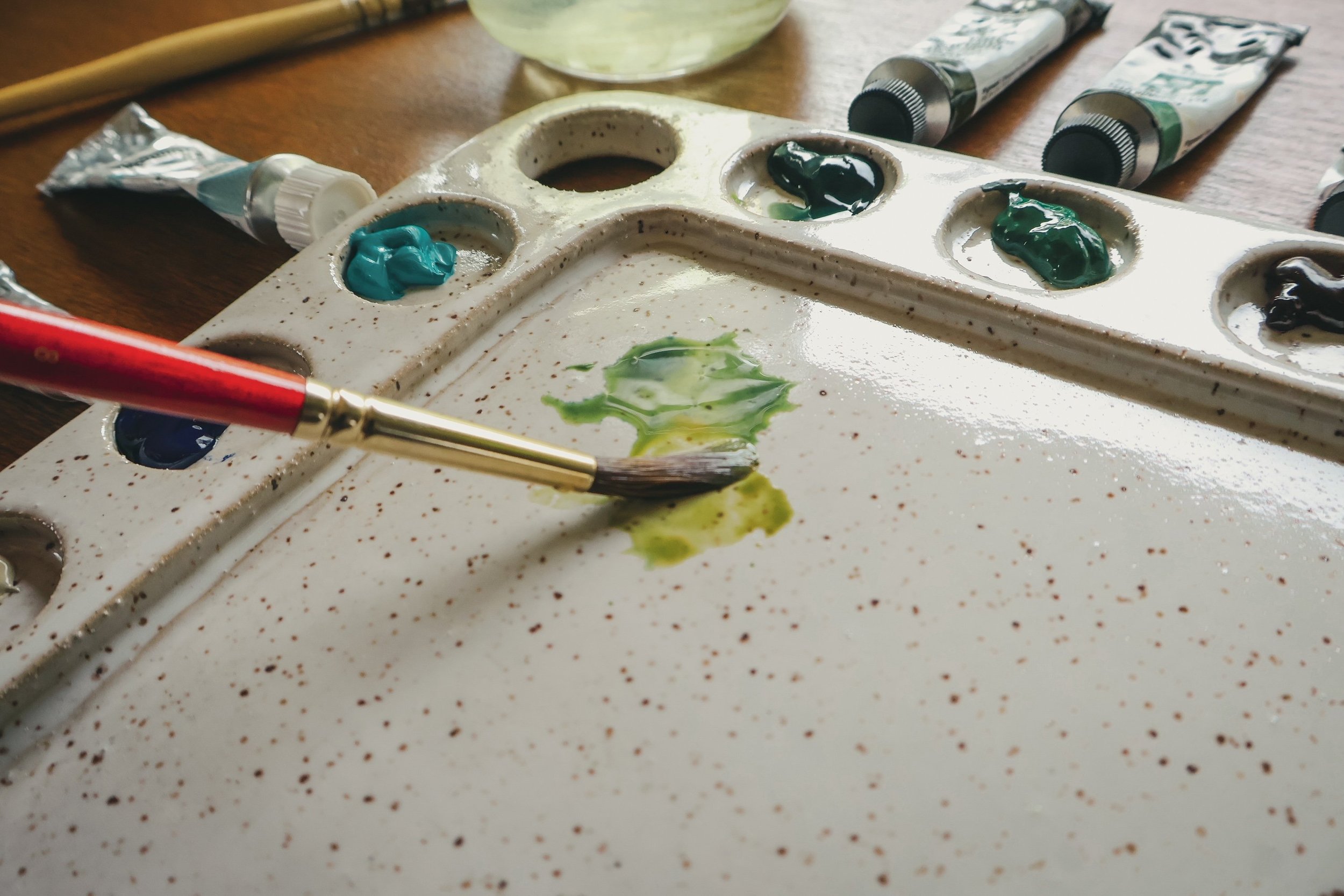 mixing paint on palette.JPG