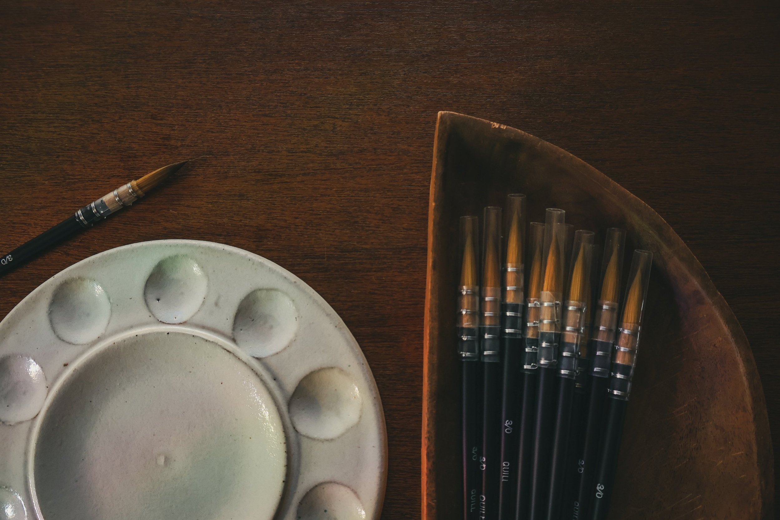 brushes and watercolor palette.JPG